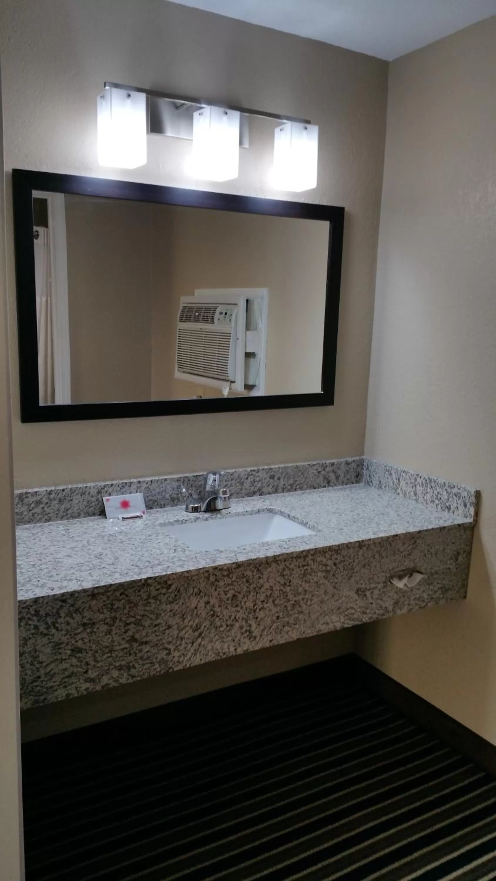 Bathroom in Westbridge Inn & Suites