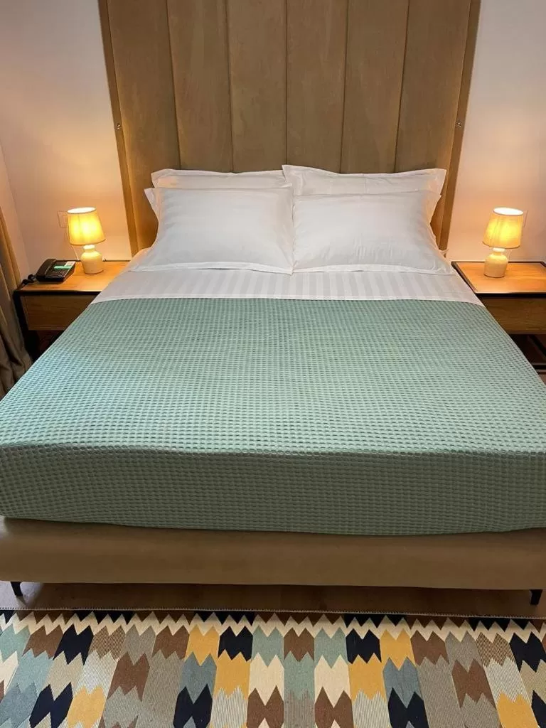 Bed in 313 Villa City Center Hotel