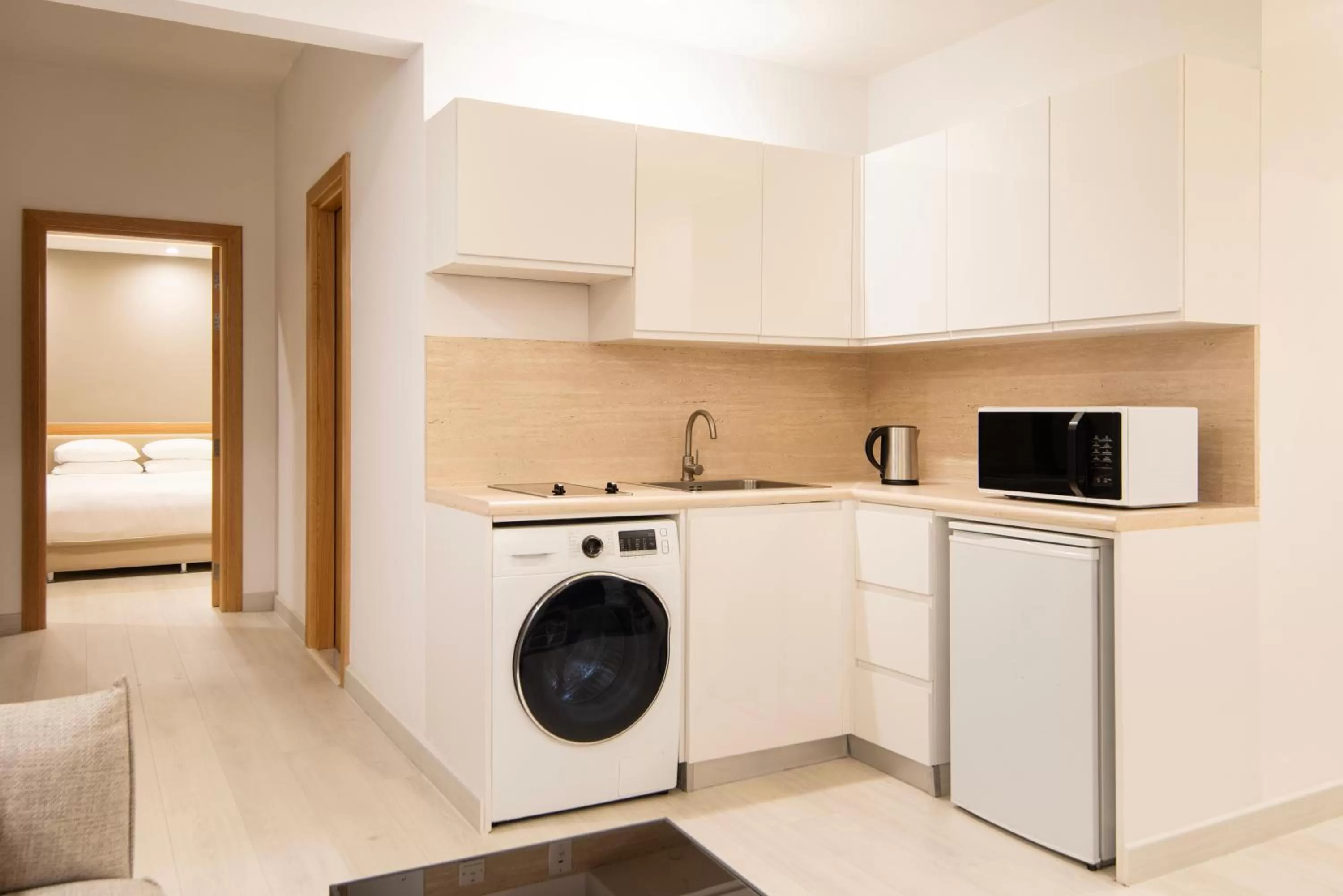 Kitchen or kitchenette in Marriott Executive Apartments City Center Doha