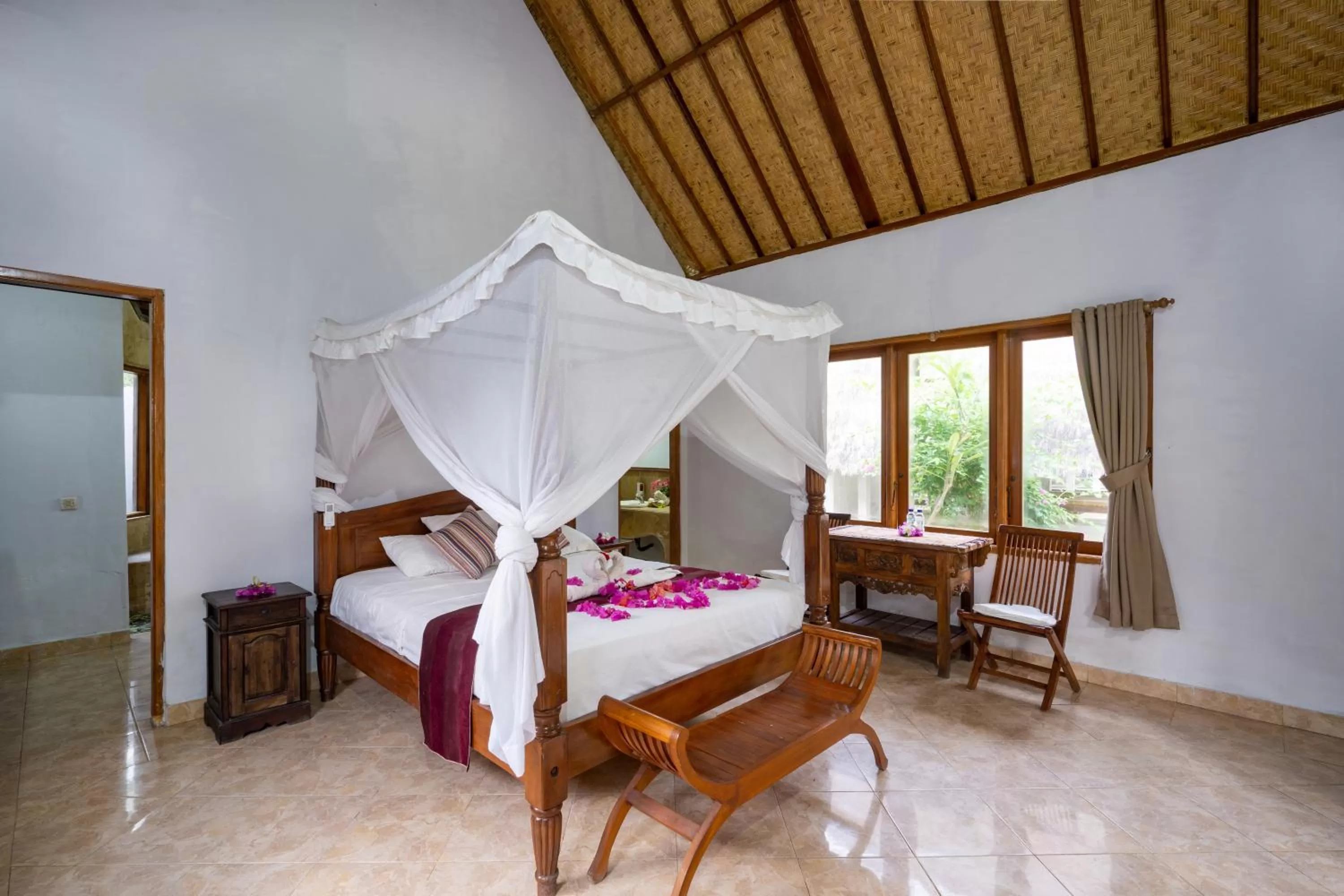 Bed in Mushroom Beach Bungalows