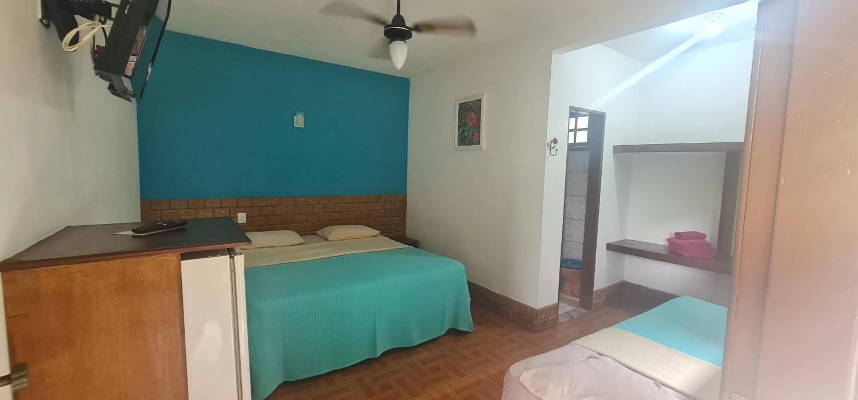 Bed in Pousada Flor de Paraty