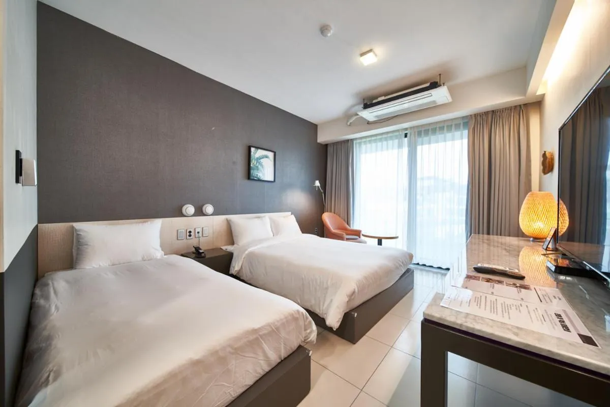 Bed in Lareem Boutique Hotel