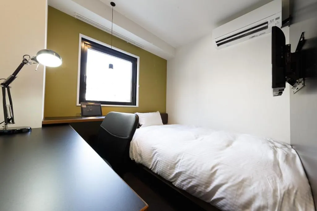 Photo of the whole room, Bed in Hotel Citio Shizuoka