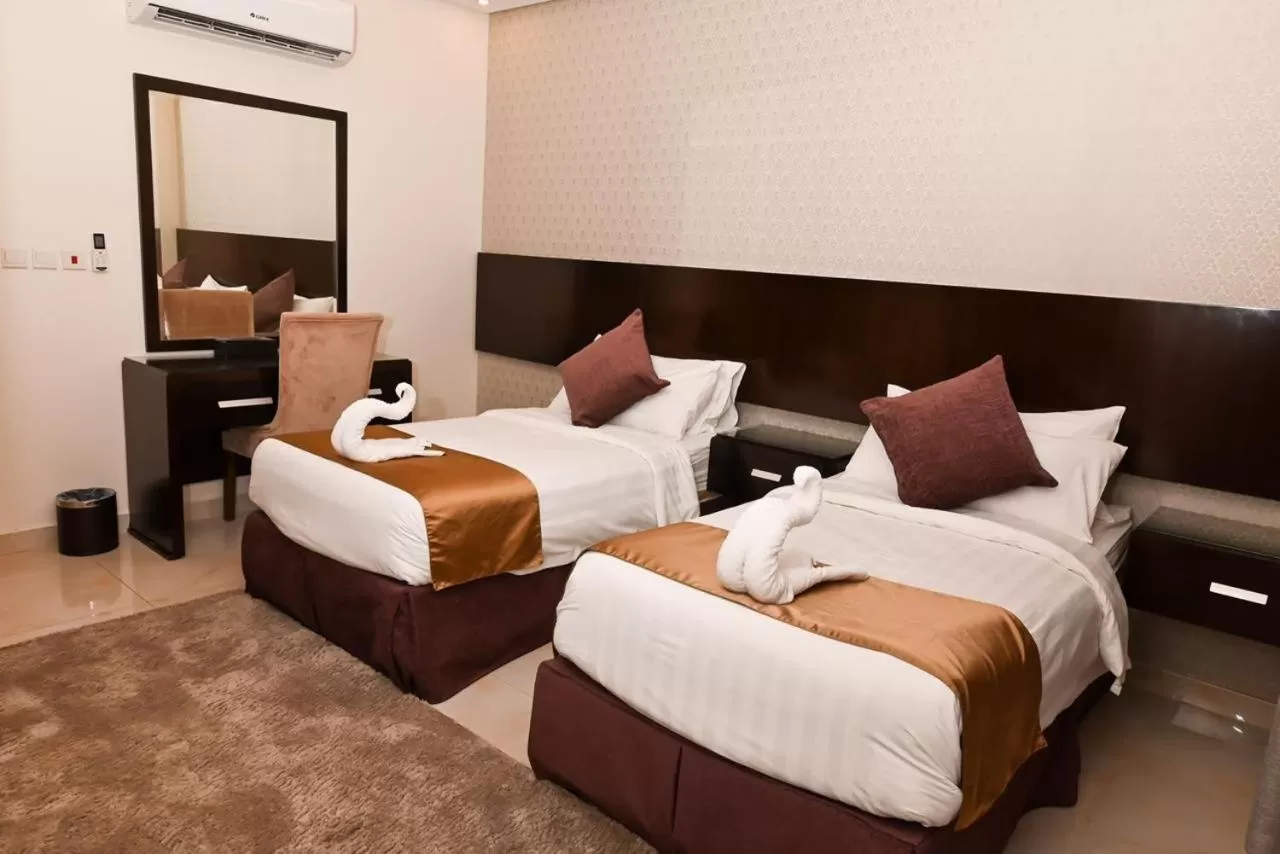 Bed in The Artisan Hotel-Suits