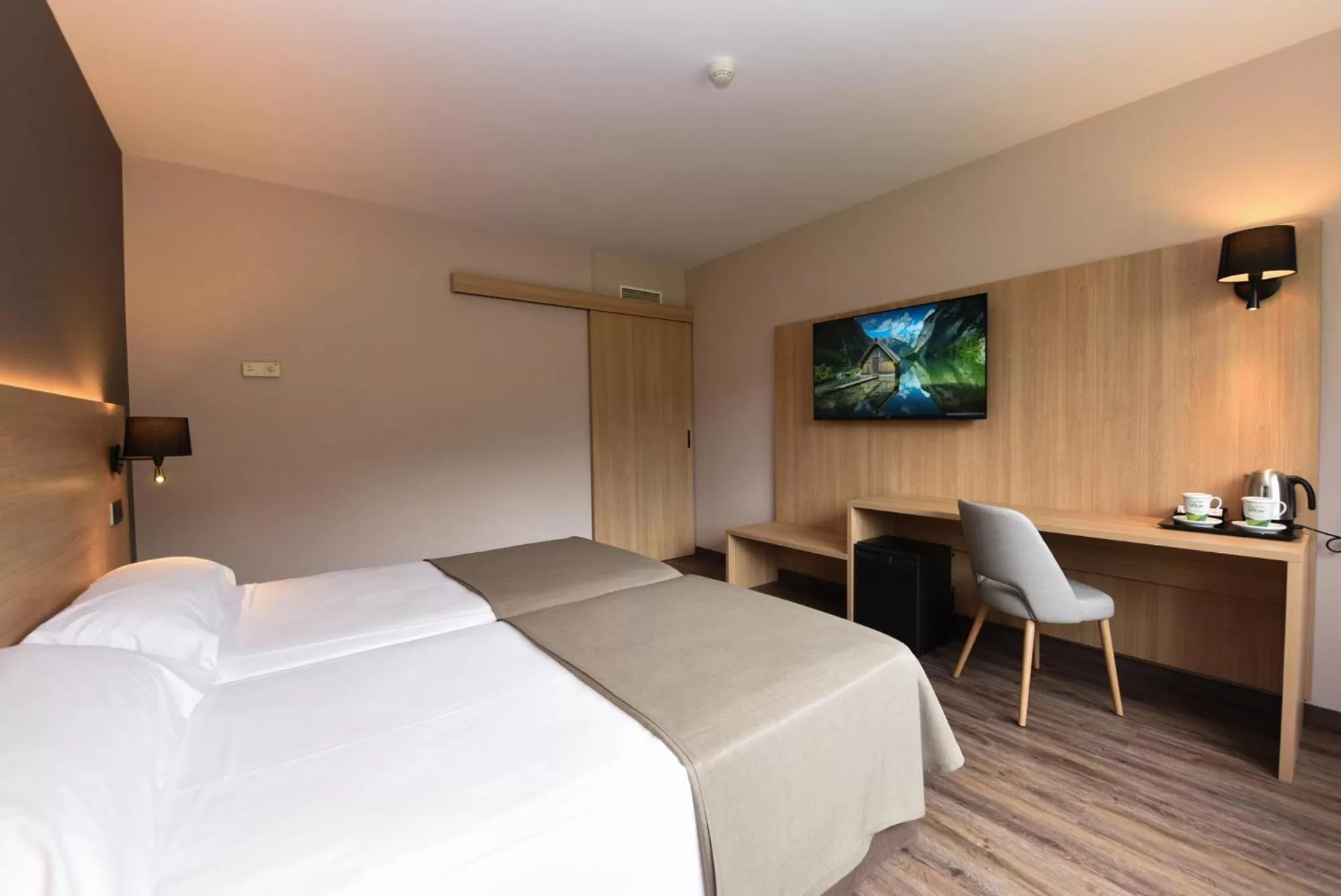 Bed in SOMMOS Hotel Benasque Spa