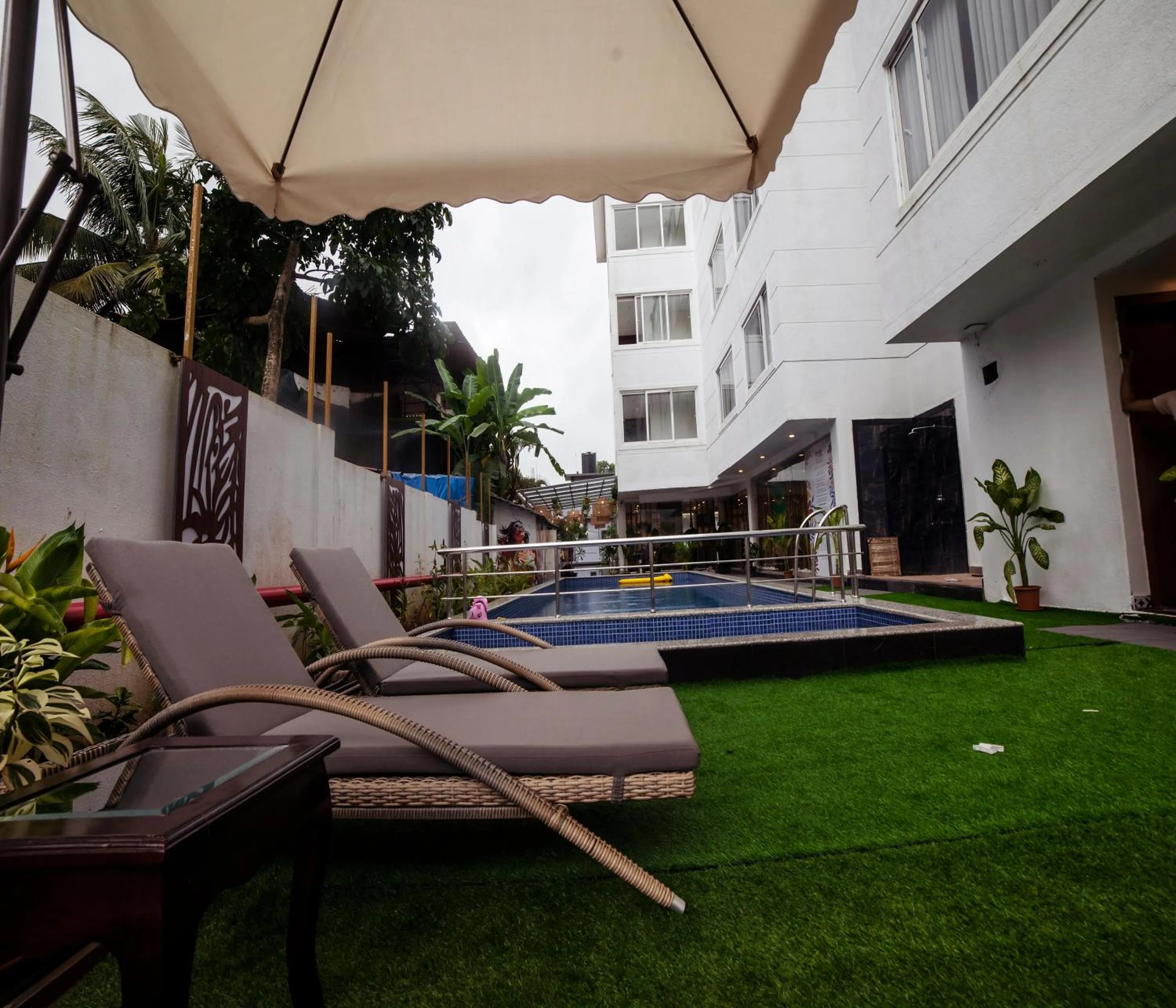 Swimming pool in HUE GUH The Porto Candolim