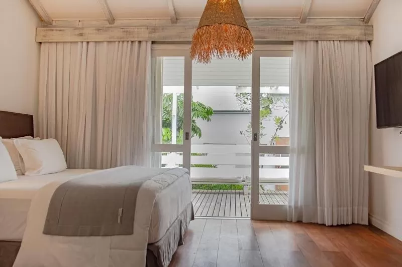 Bed in Felissimo Exclusive Hotel