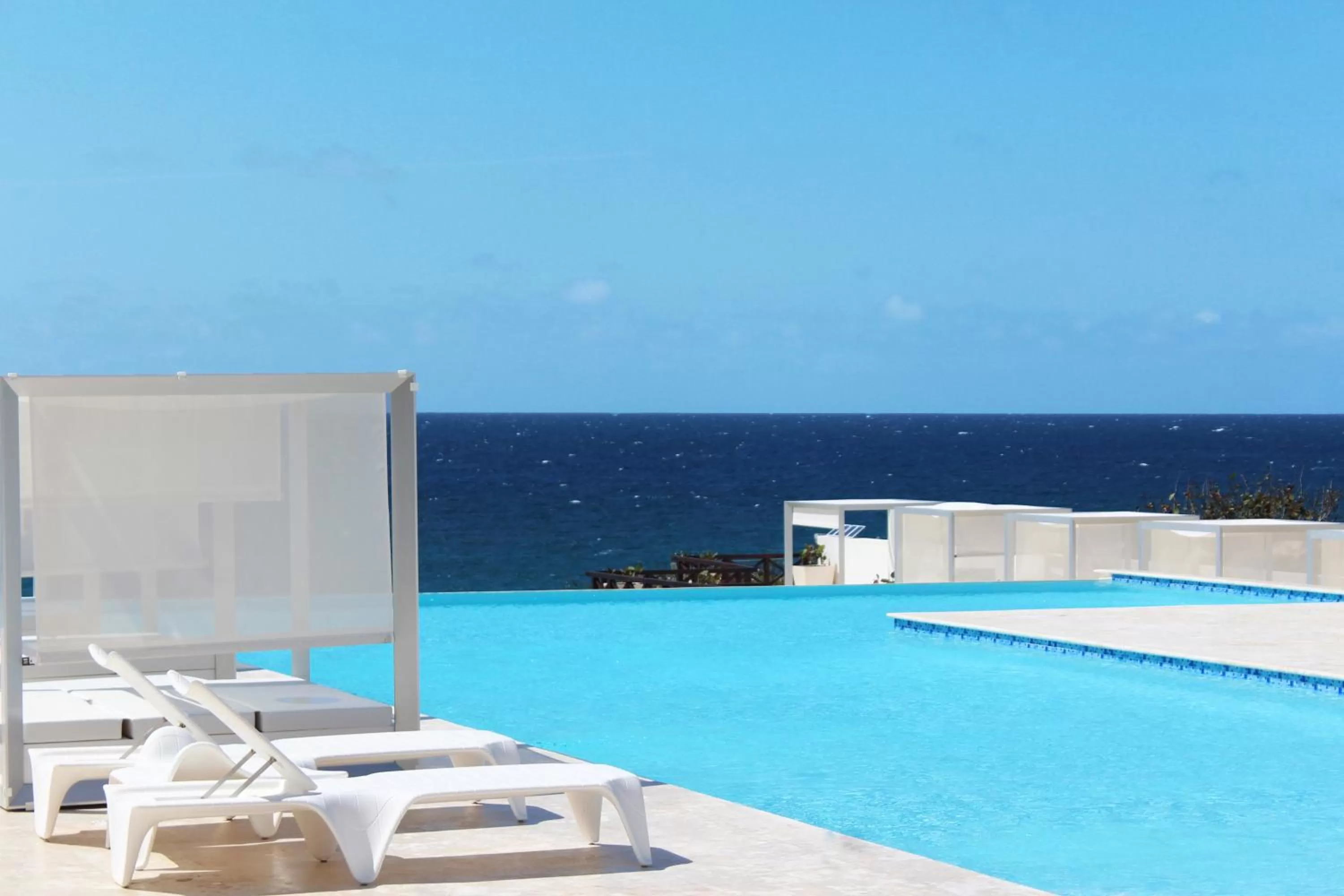 Restaurant/places to eat, Swimming Pool in Ocean Village Deluxe Resort & Spa