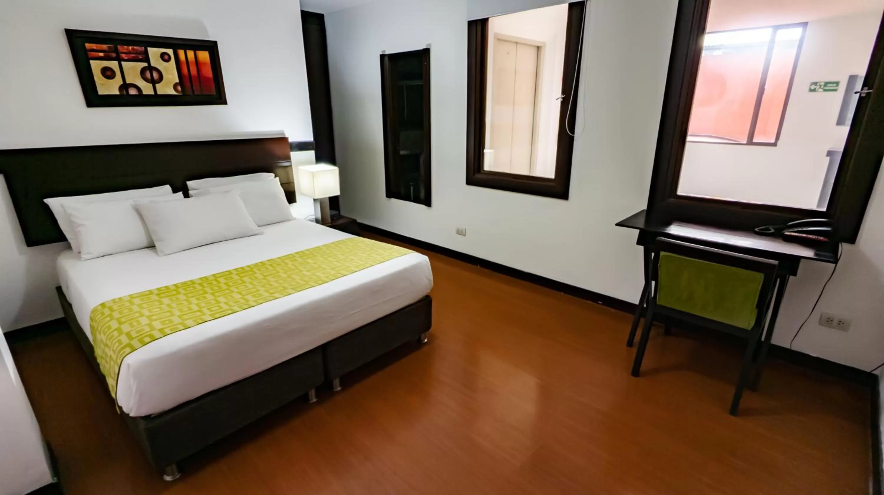 Bed in Hotel Charlotte Suite 26