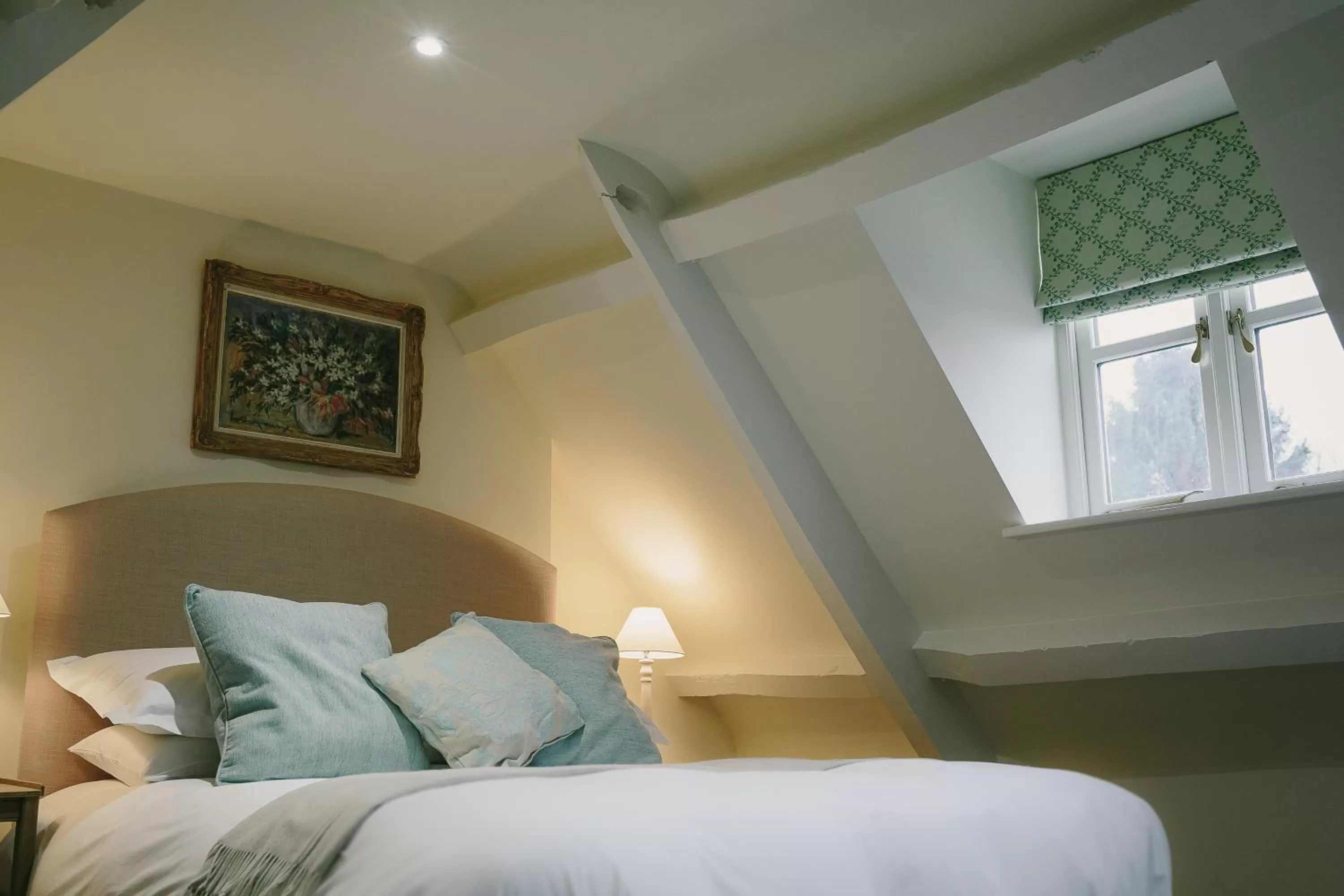 Bed in Cat and Custard Pot Inn