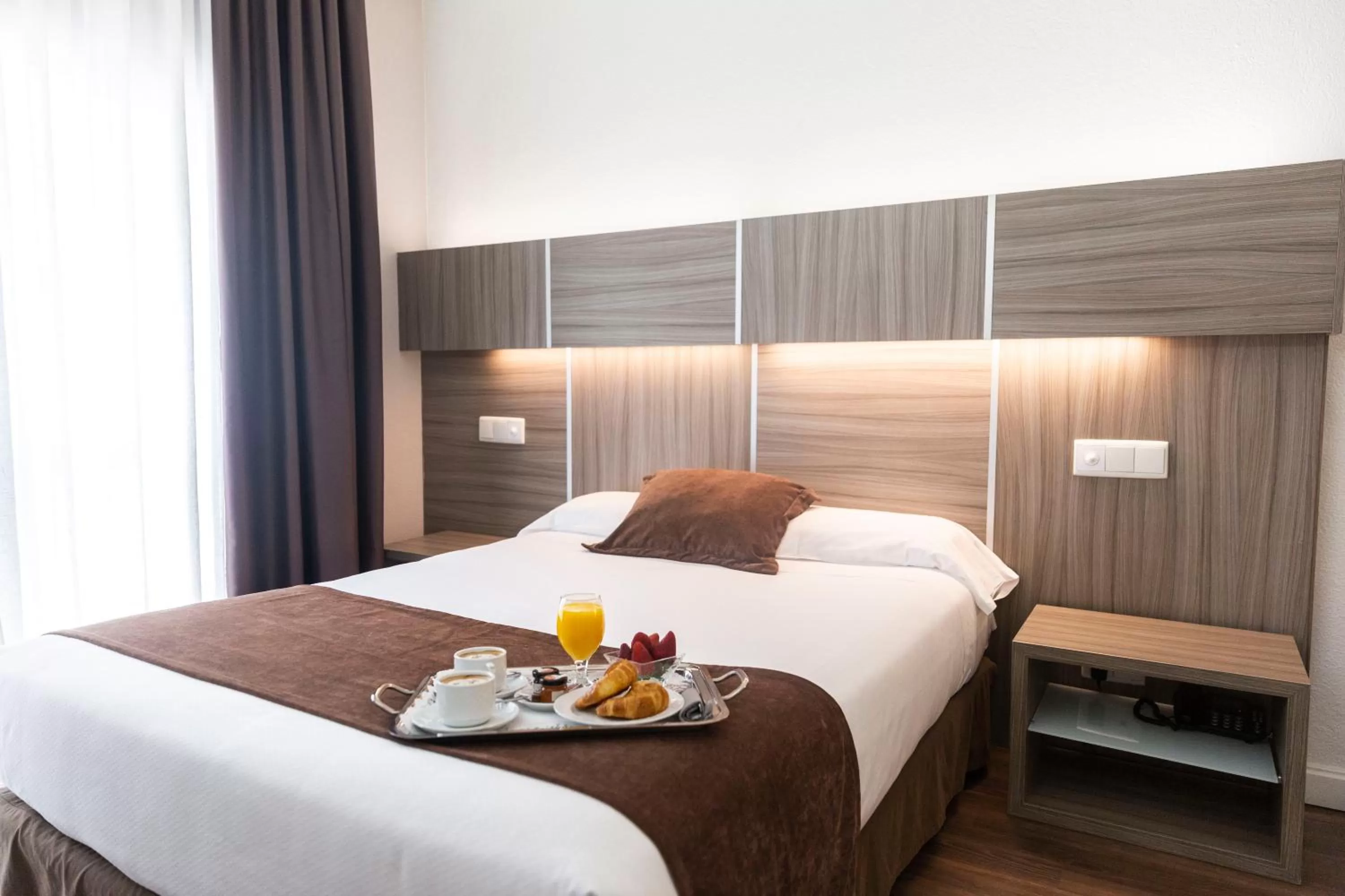 Bed in Hotel Serrano