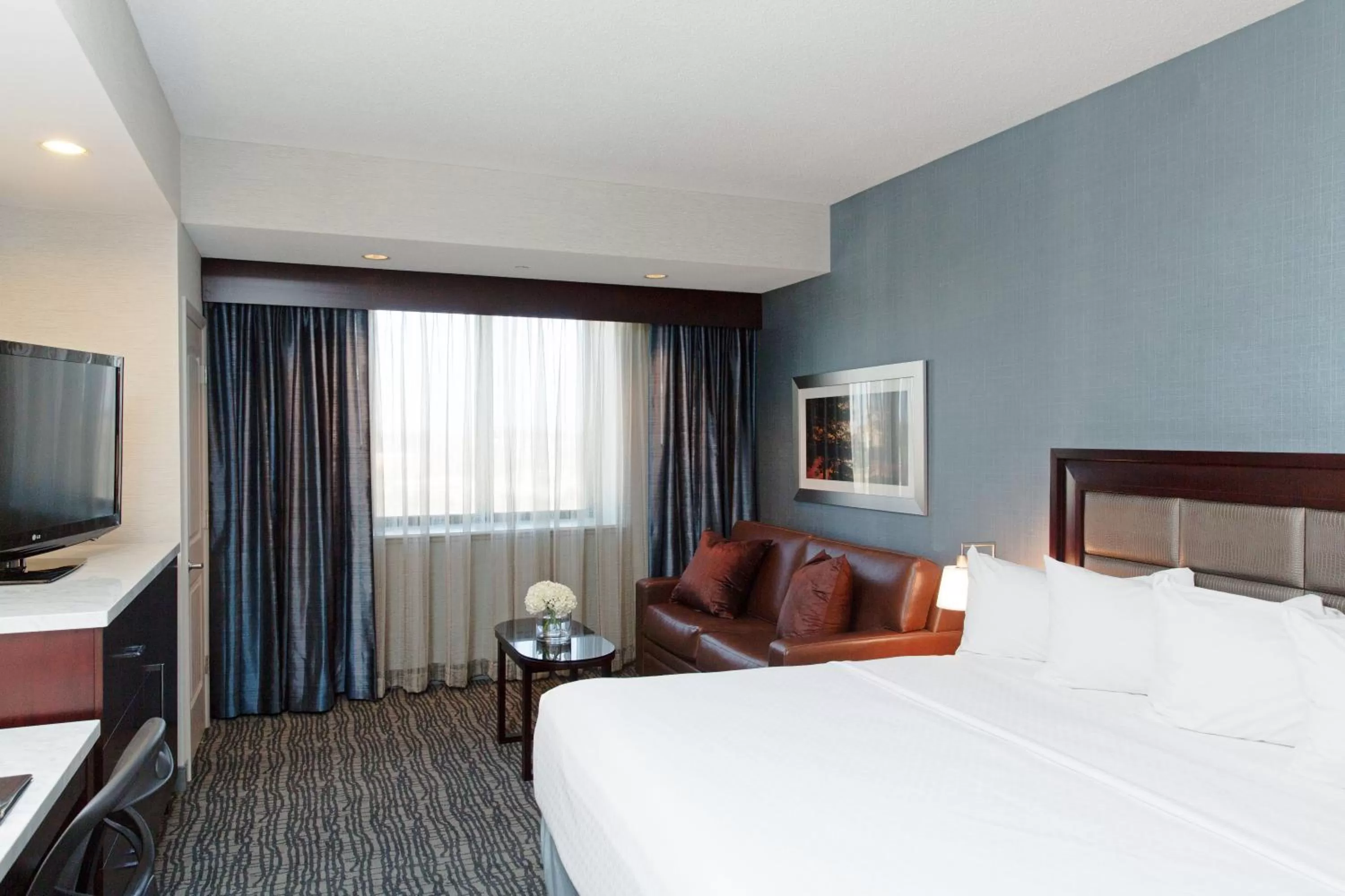 Photo of the whole room, Bed in Crowne Plaza Springfield Convention Center by IHG