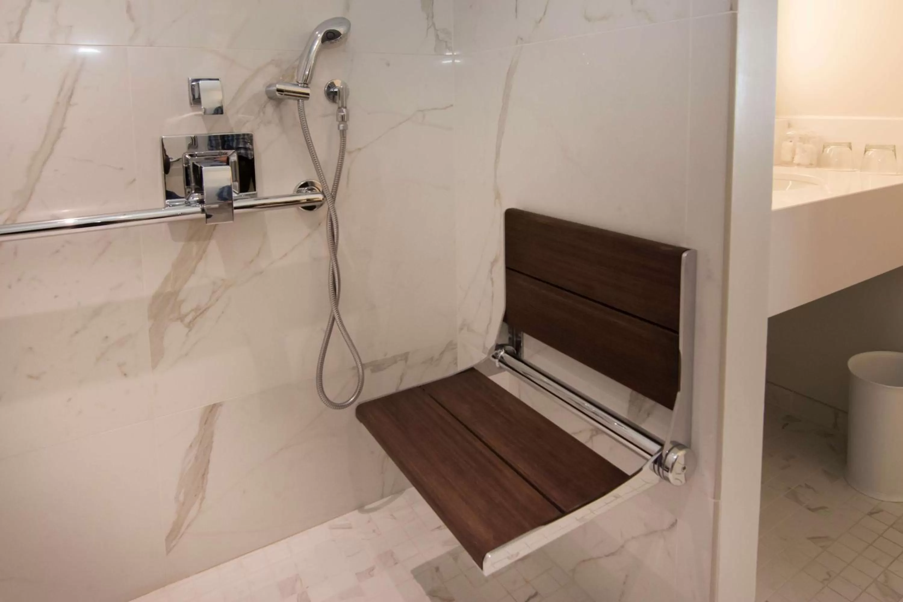 Shower in The Benson Portland, Curio Collection by Hilton