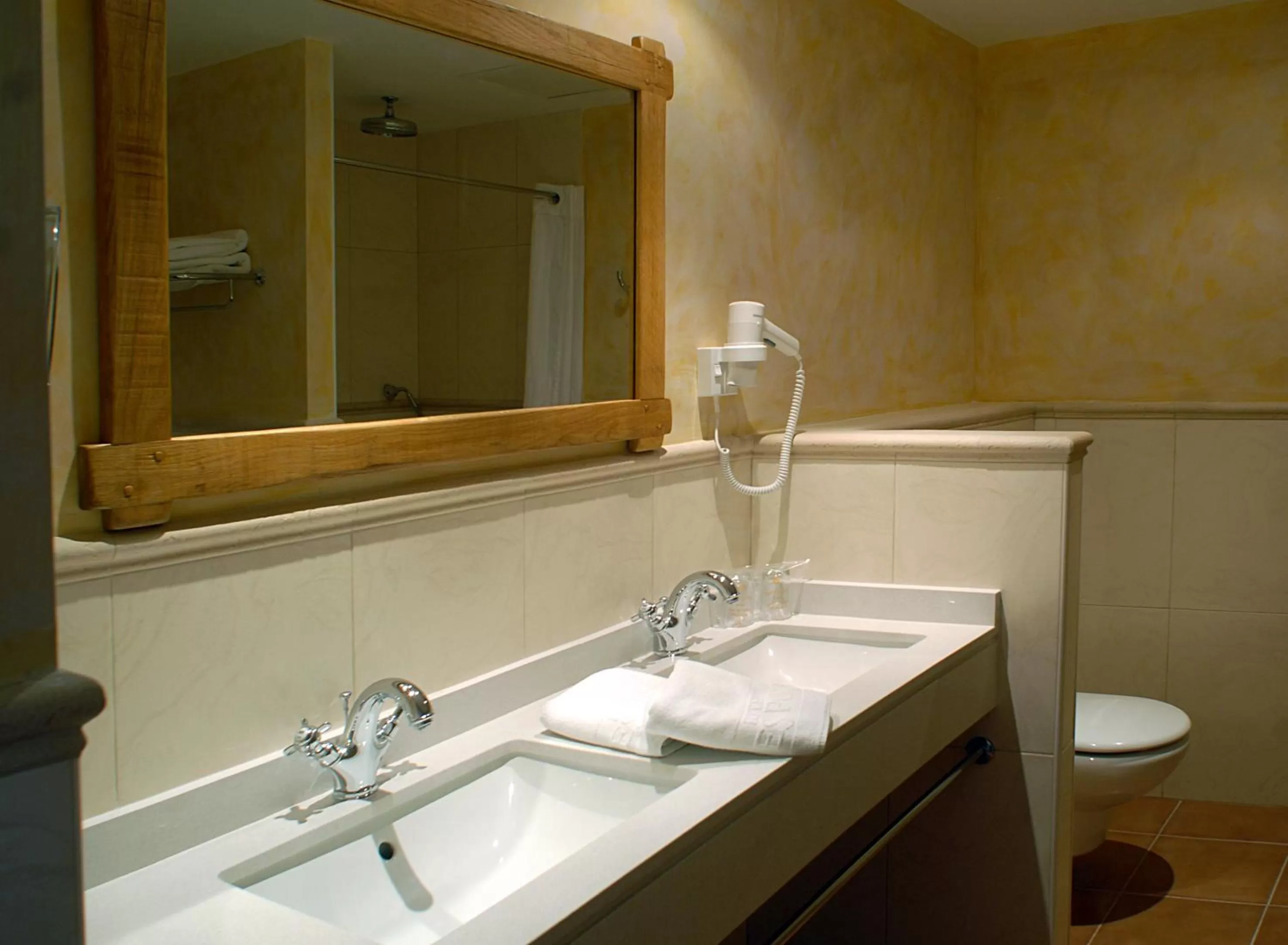 Bathroom in Hotel Es Port