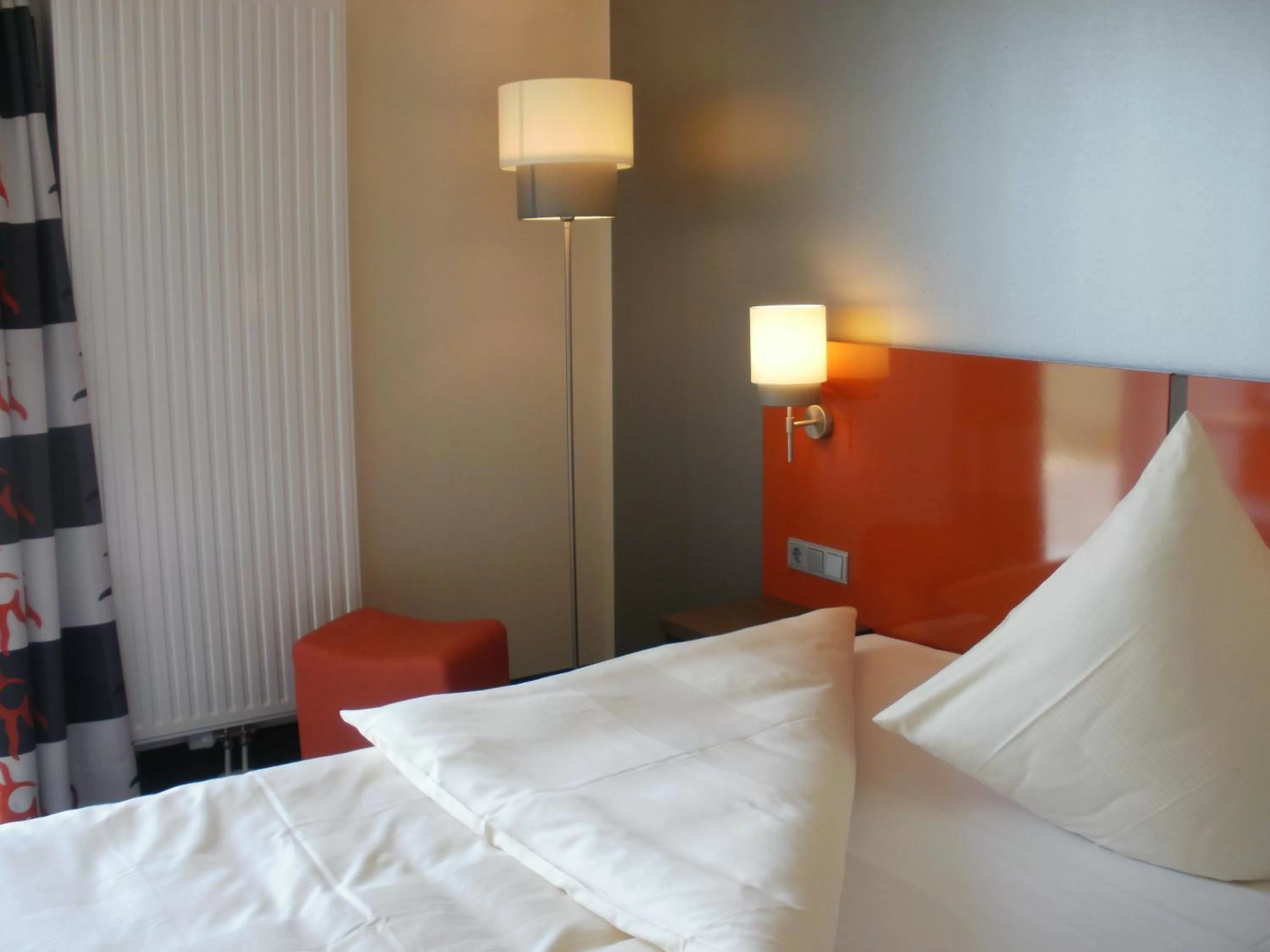Bed in iQ-Hotel Ulm
