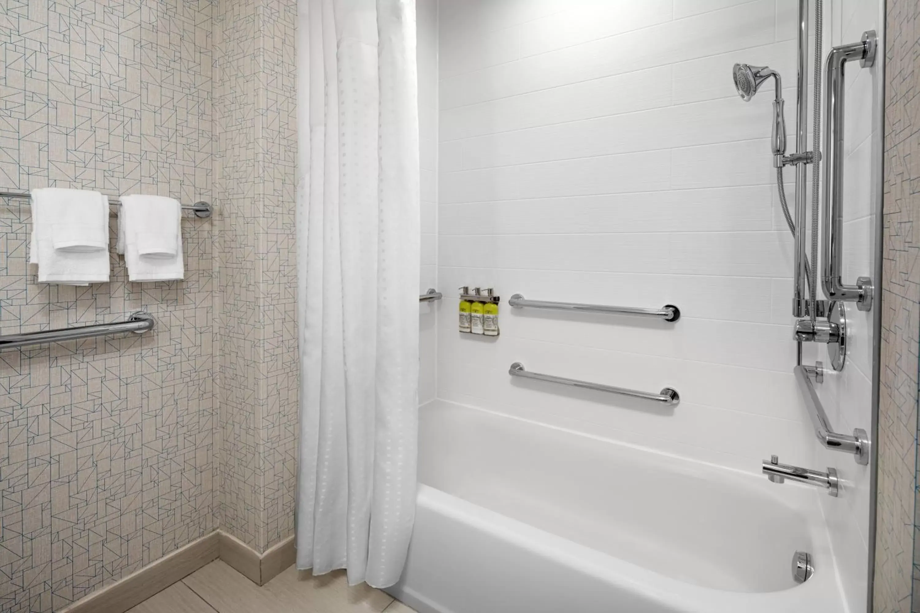 Queen Room with Two Queen Beds and Mobility Accessible Tub in Holiday Inn Express & Suites - Woodside Queens NYC, an IHG Hotel Queen Room with Two Queen Beds and Mobility Accessible Tub in Holiday Inn Express & Suites - Woodside Queens NYC, an IHG Hotel