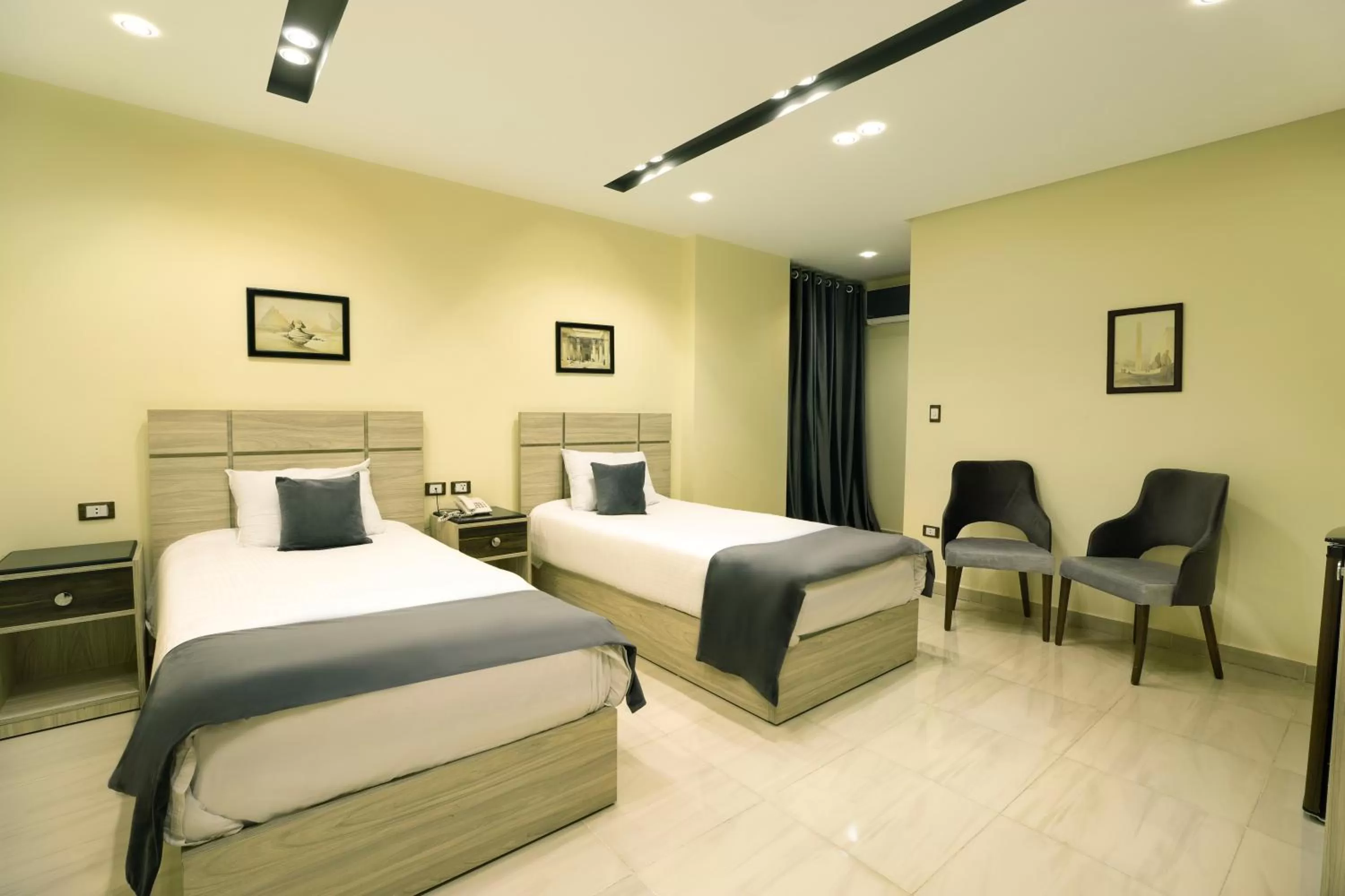 Bed in Brothers Pyramids View Hotel