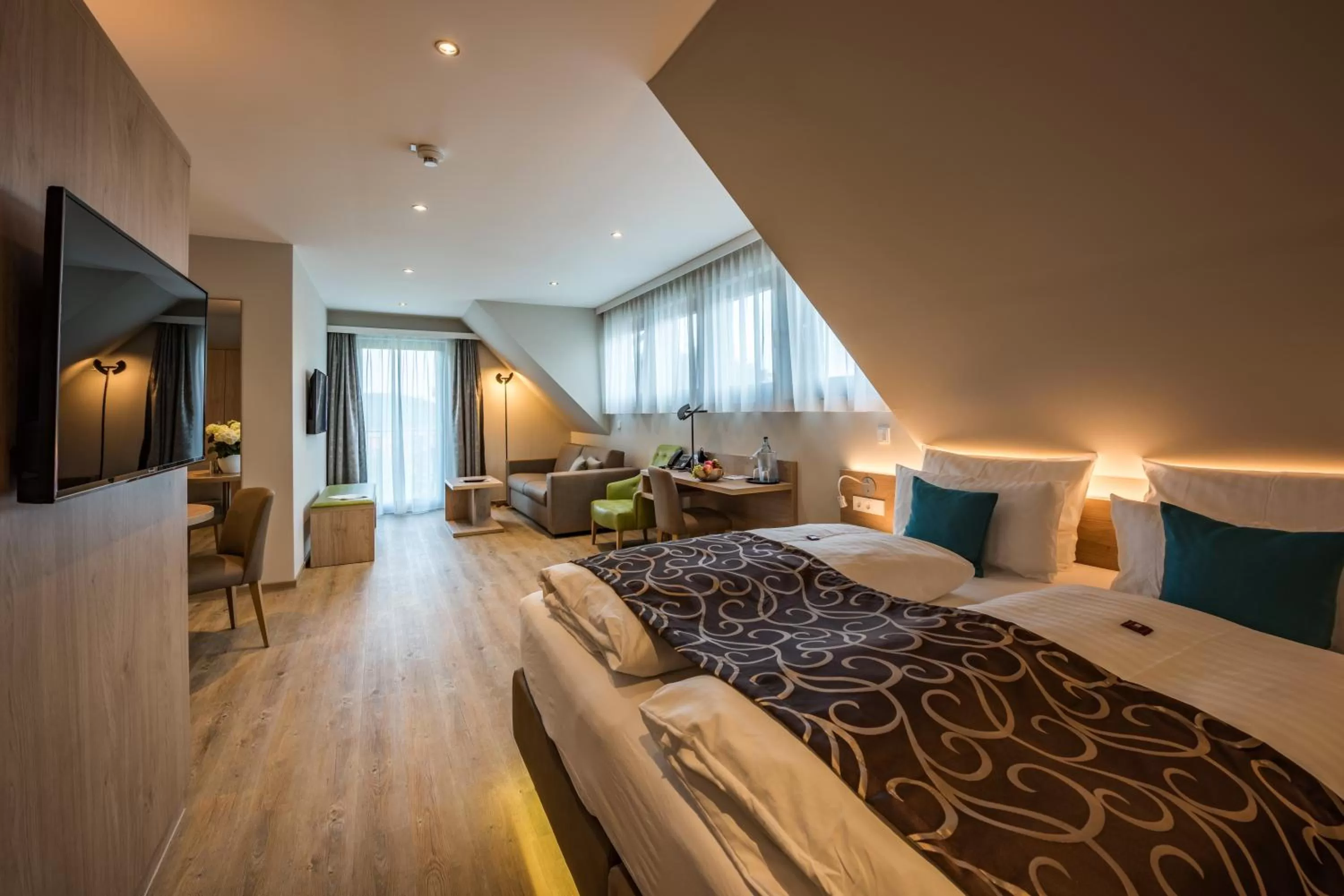 Photo of the whole room, Bed in AKZENT Hotel Villa Saxer