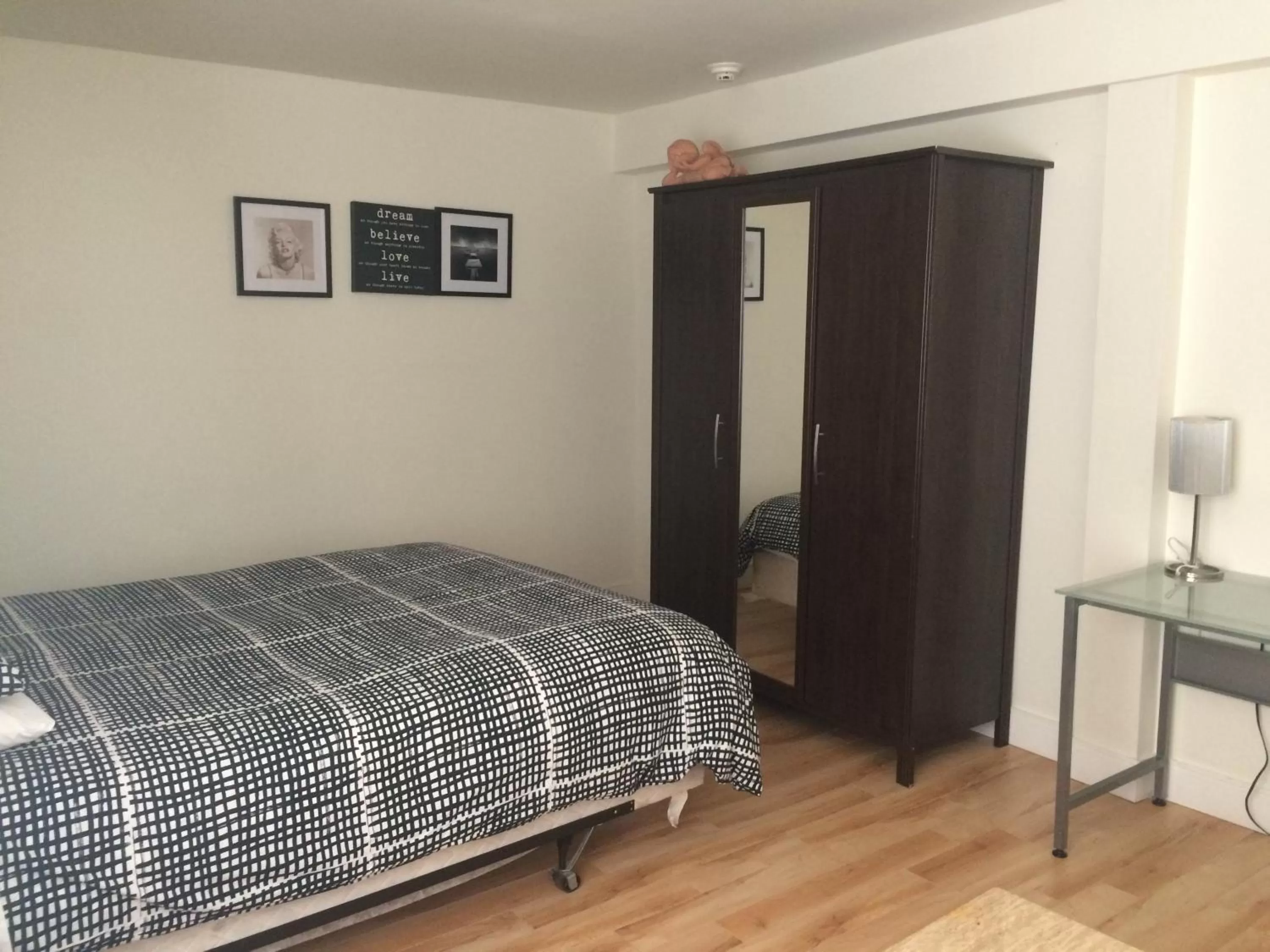 Bed in Black Rooster Guesthouse