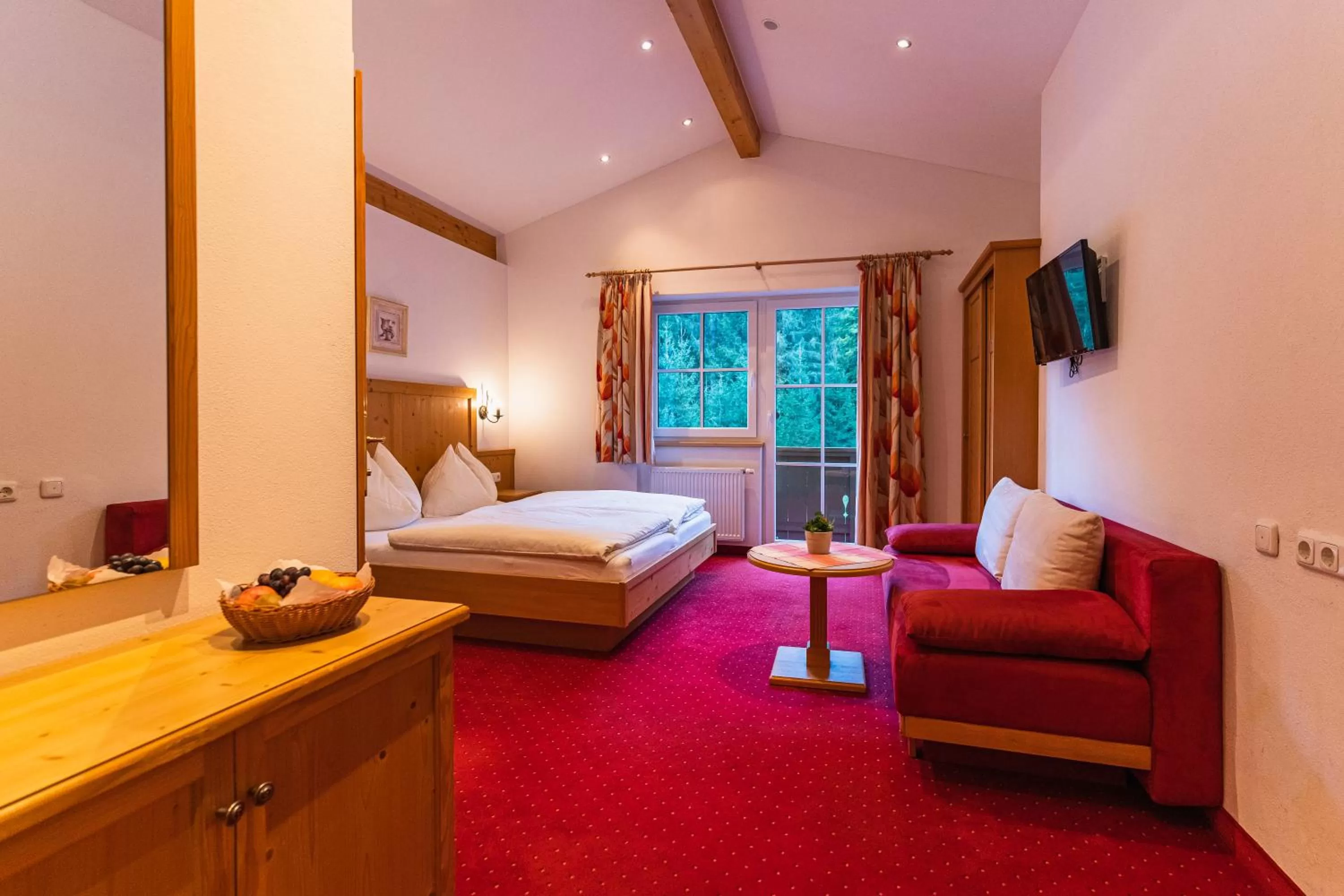 Photo of the whole room, Bed in Hotel Der Schmittenhof