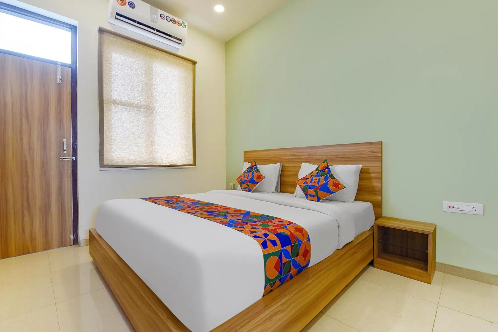 Bed in FabHotel Prime Oxus