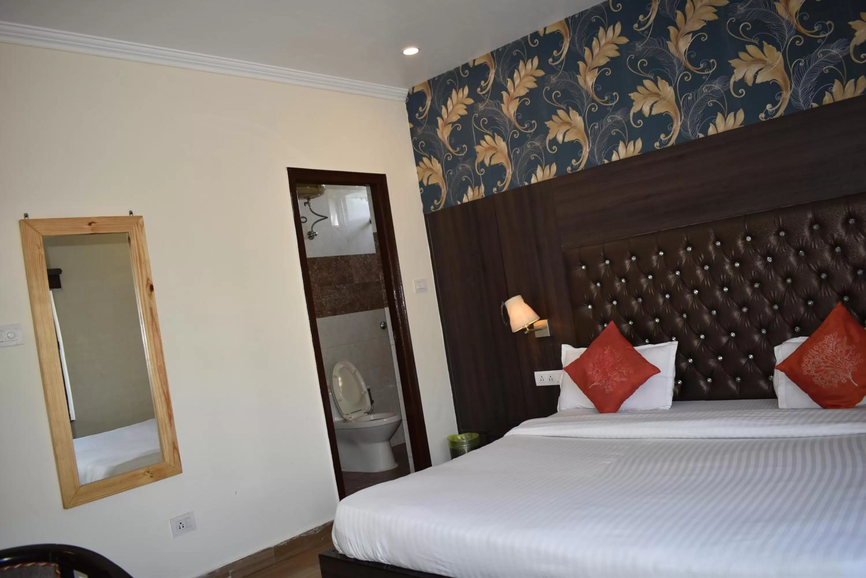 Bedroom, Bed in Tapasthali by Meera Hotels