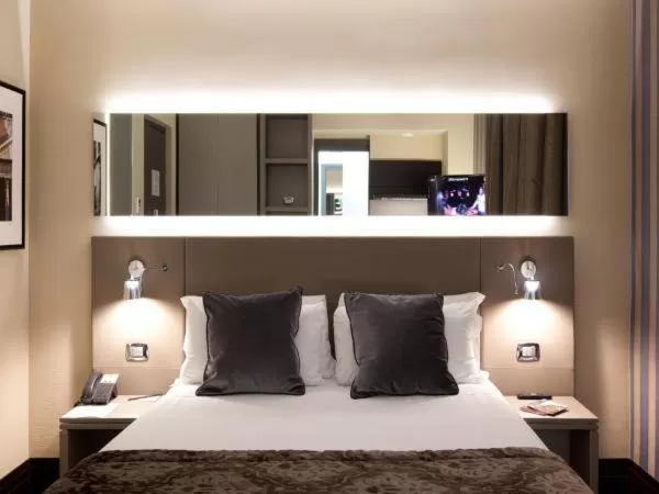 Bed in Trevi Palace Hotel