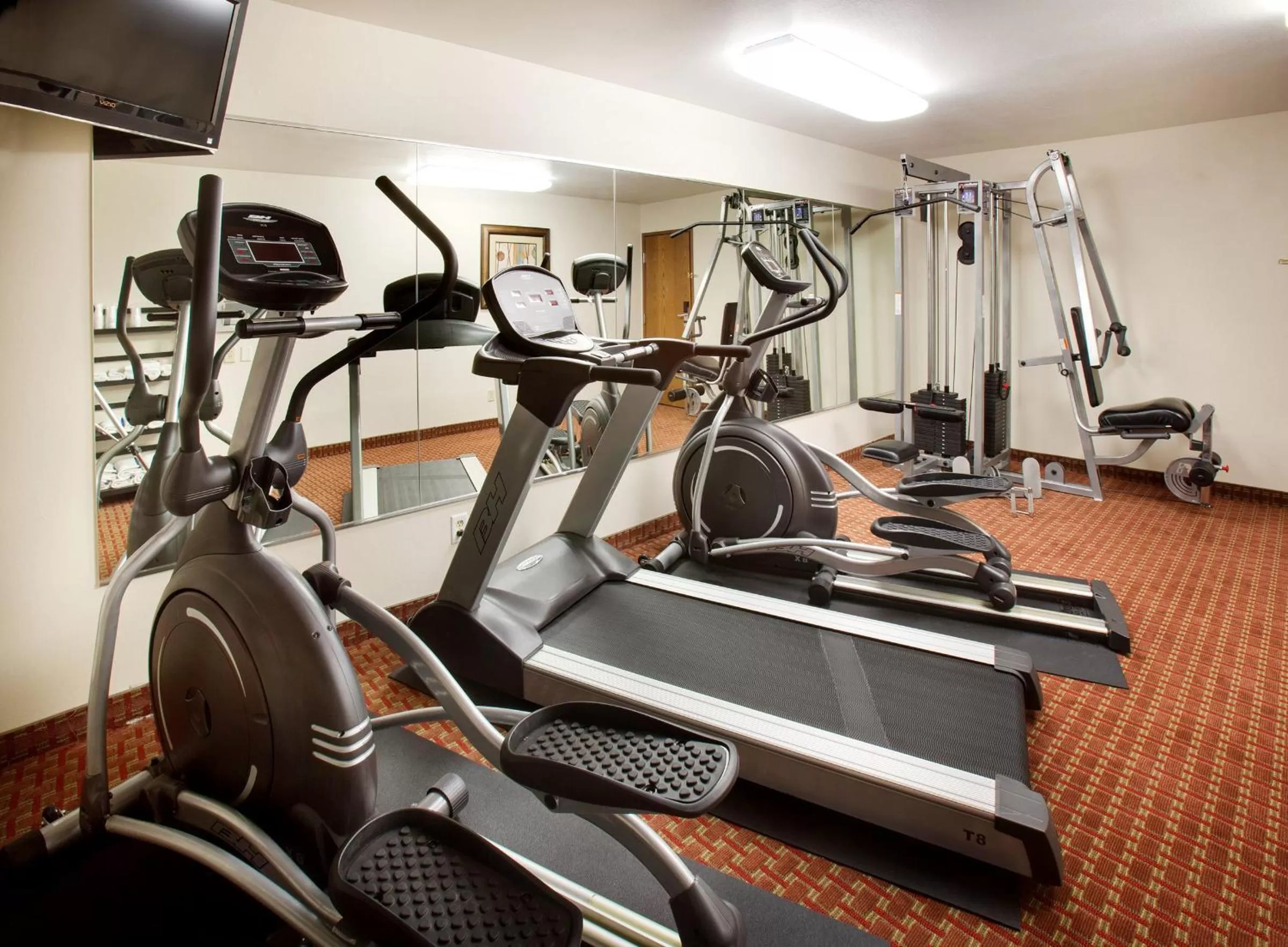 Fitness centre/facilities in AmericInn by Wyndham Johnston Des Moines