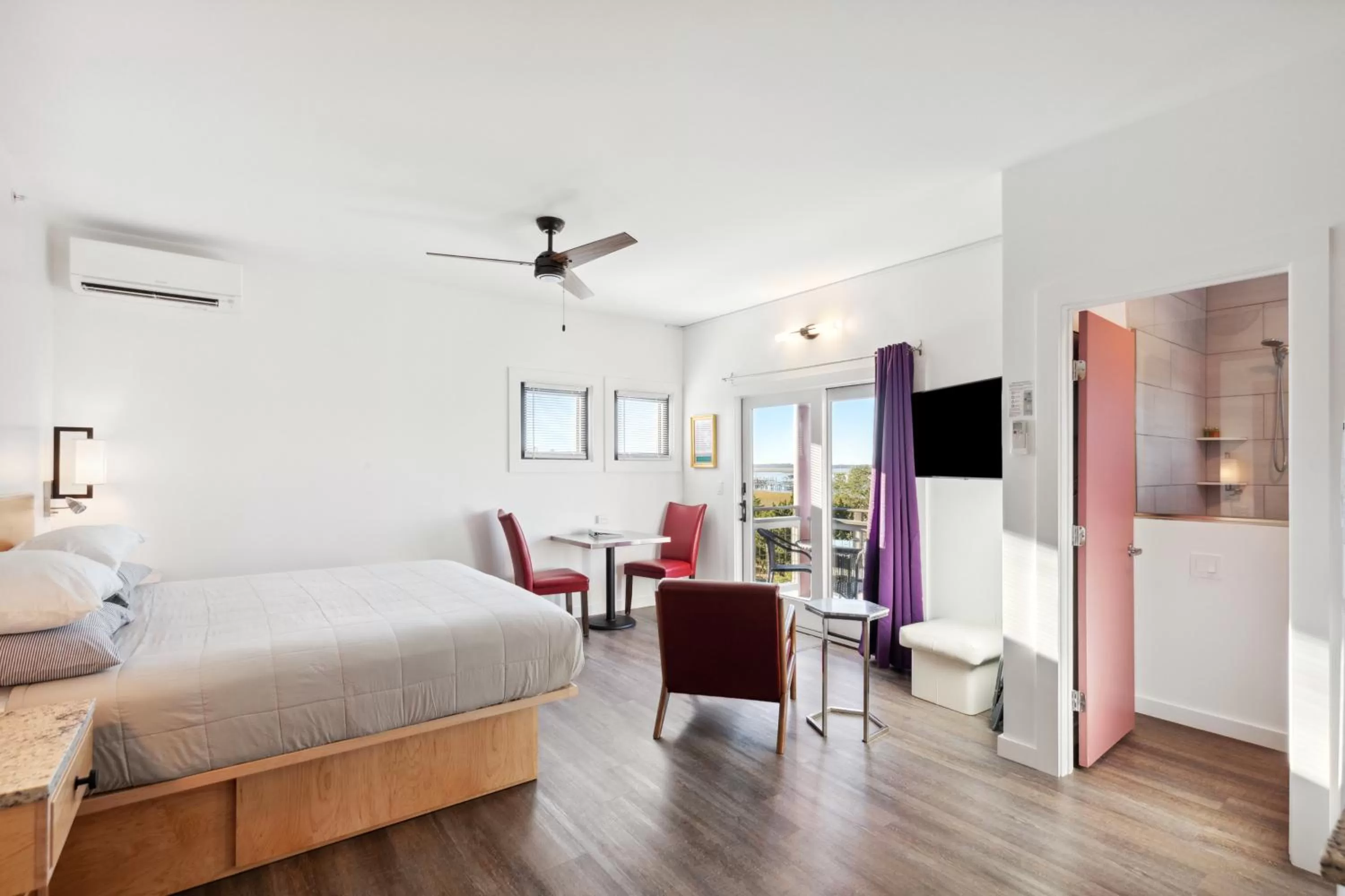 Bed in Hotel Folly with Marsh and Sunset Views