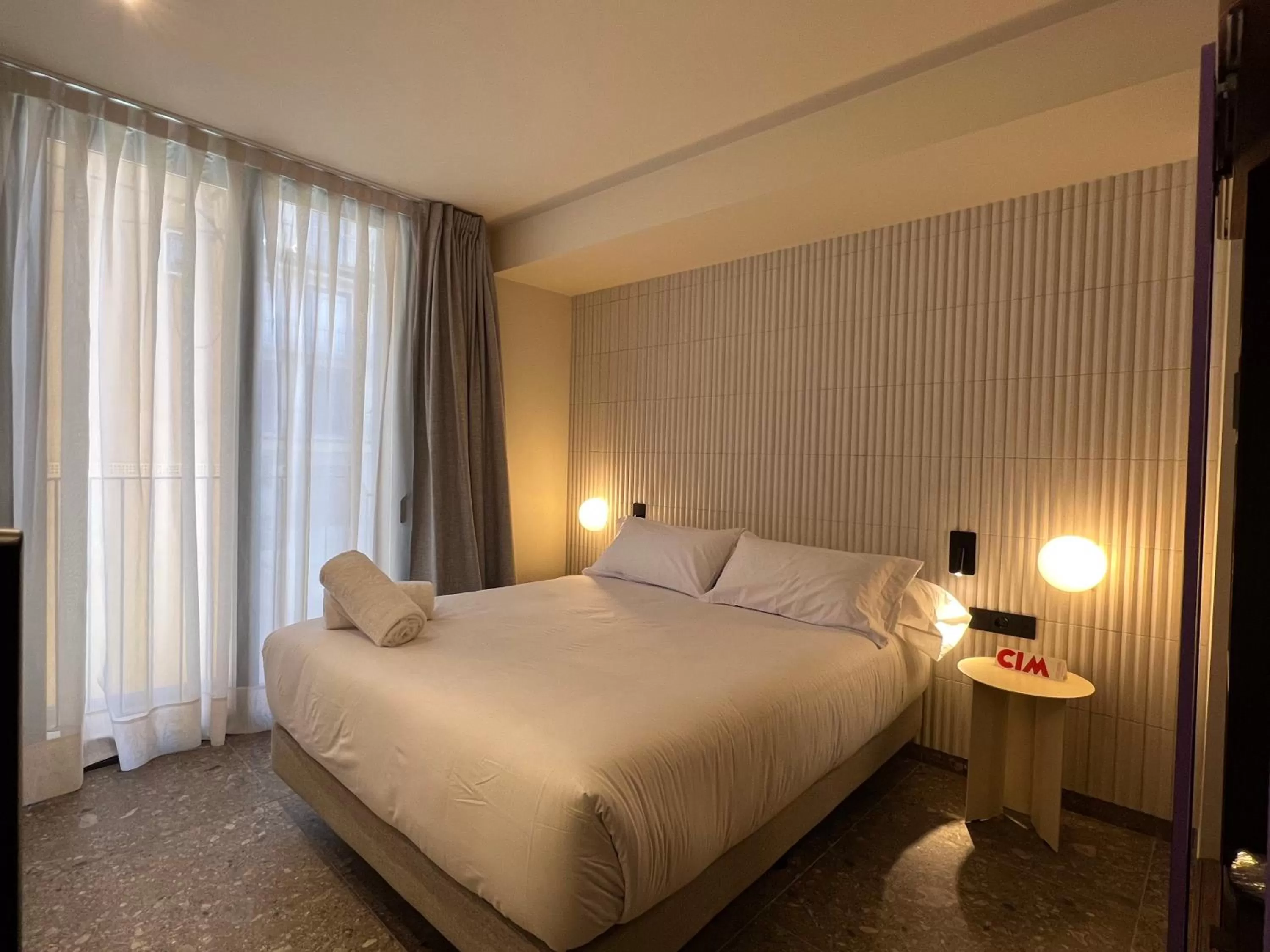 Bed in CIM HOTEL BOUTIQUE