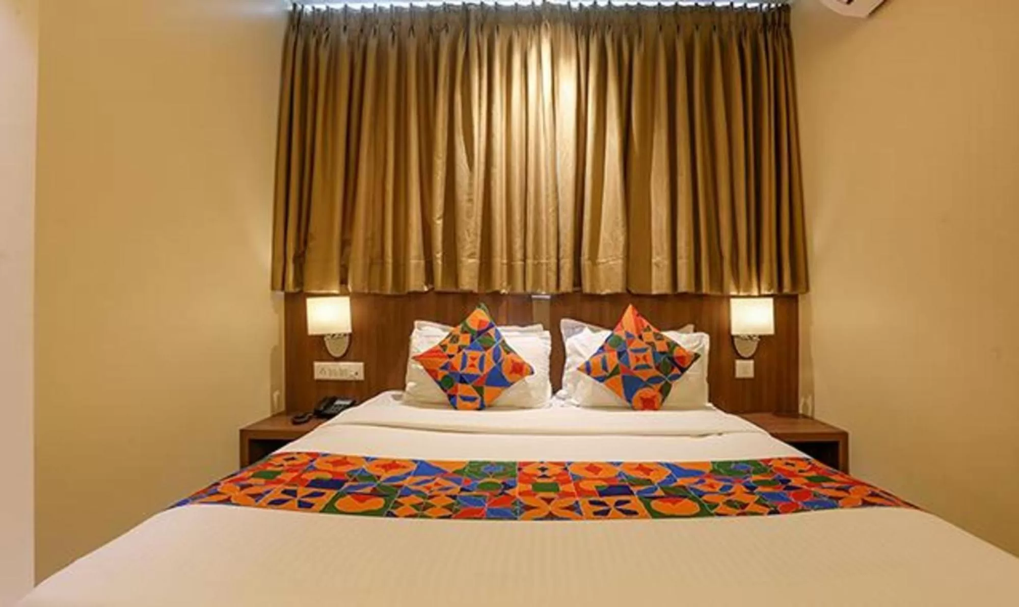 Bed in FabHotel Royal Mumbai International Airport
