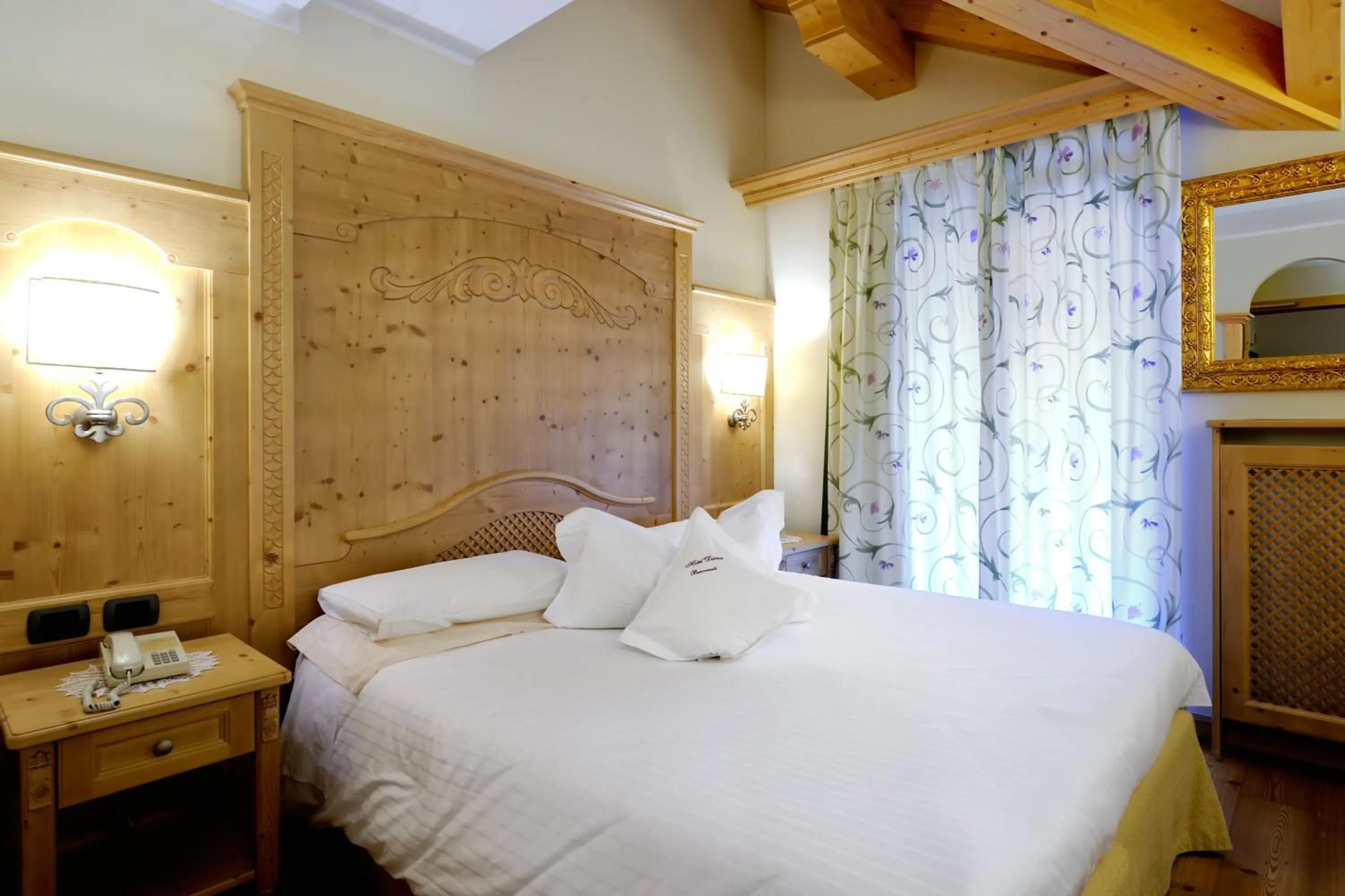 Bed in Boutique Hotel Diana