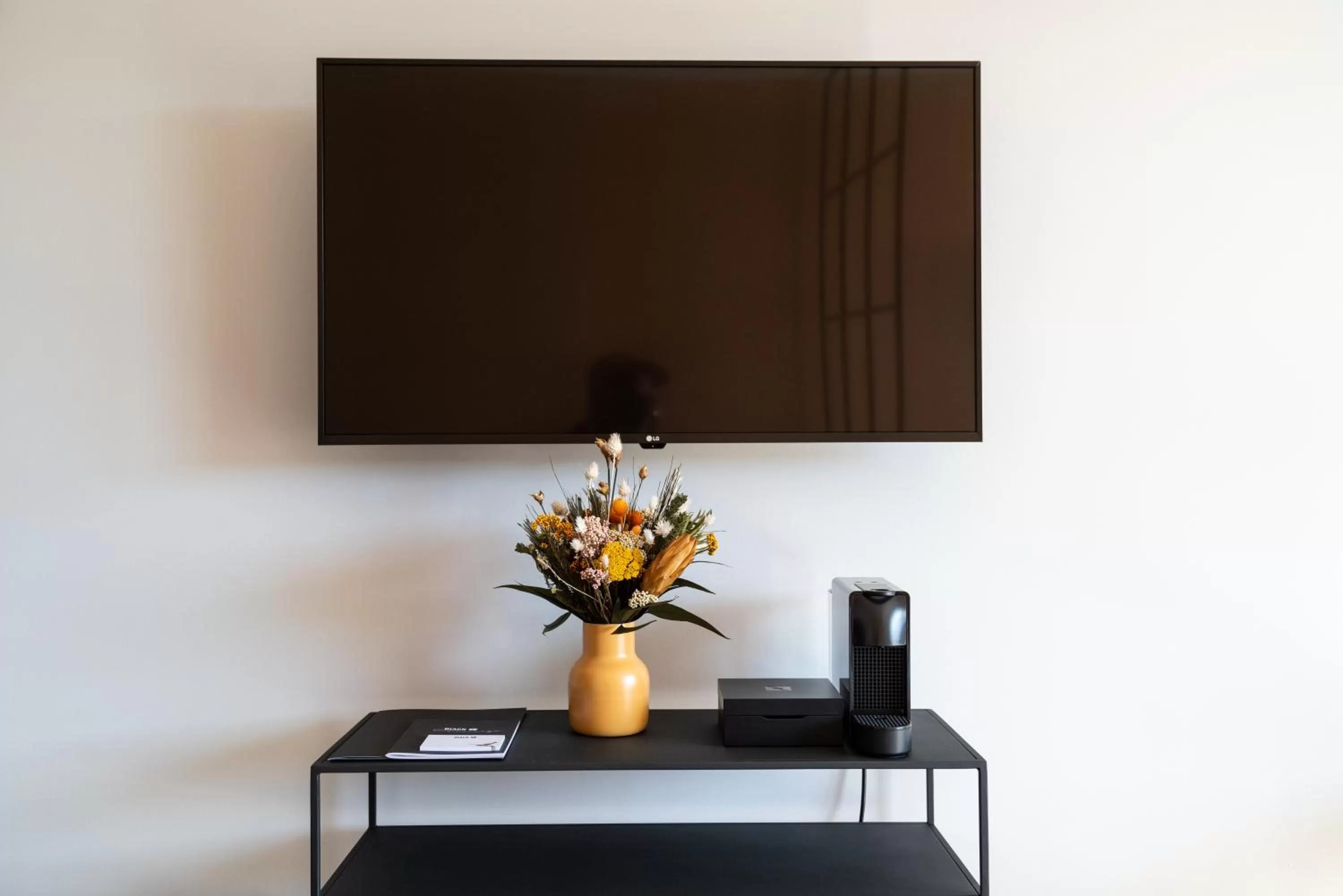 TV and multimedia, TV/Entertainment Center in Black F Tower - Serviced Apartments