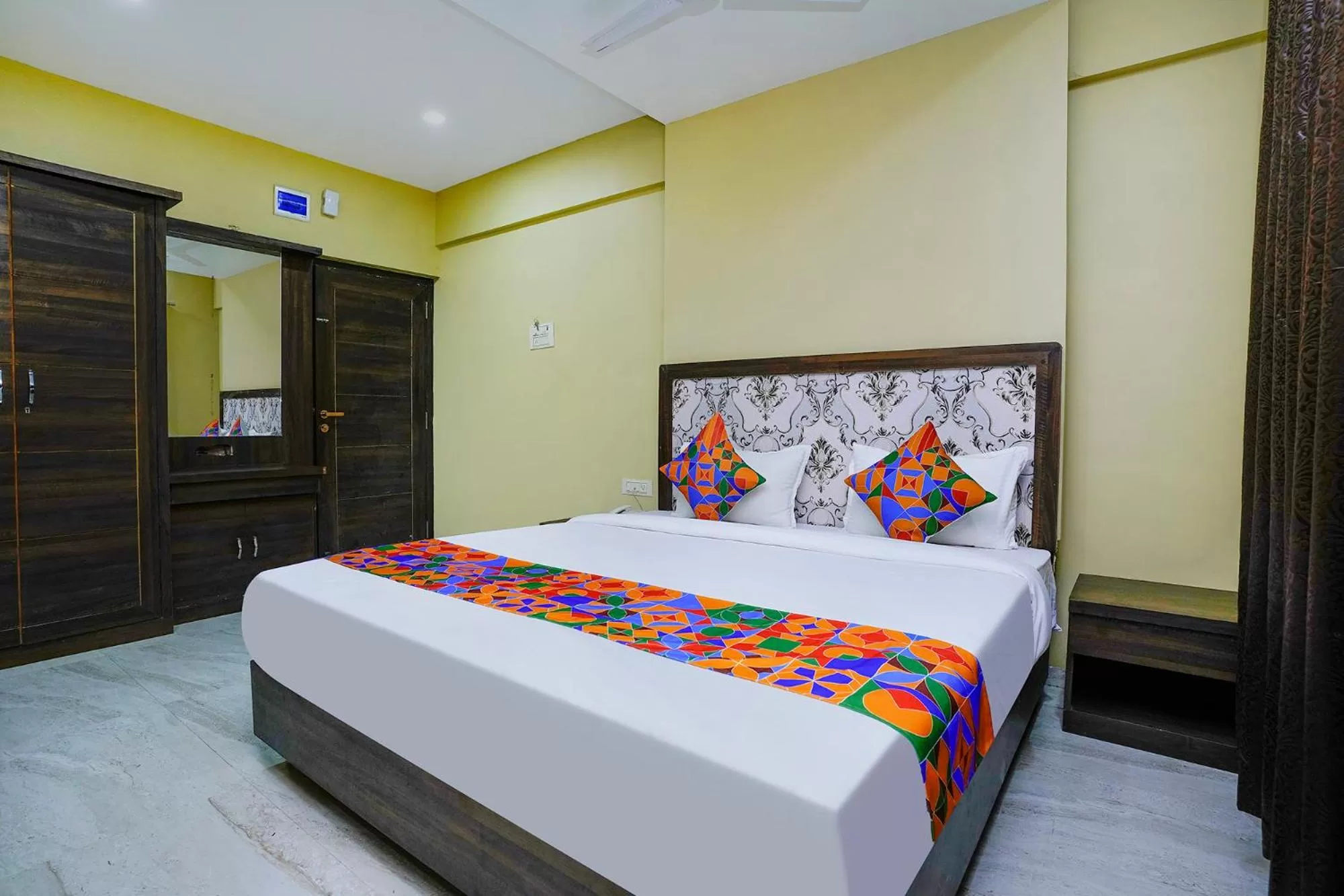 Bed in FabHotel Bhiwandi Palace