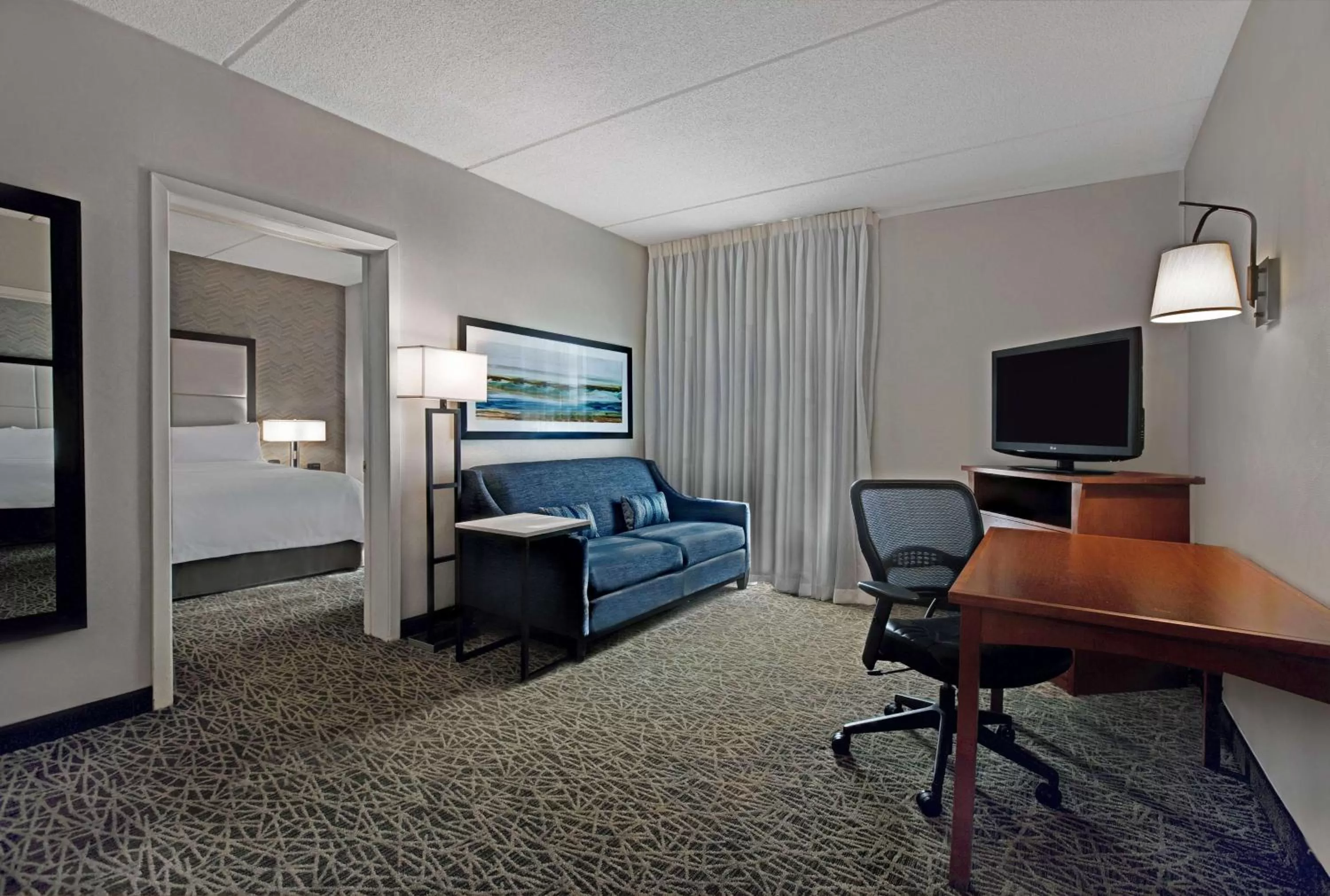 Living room, Bed in Homewood Suites by Hilton Chicago-Lincolnshire
