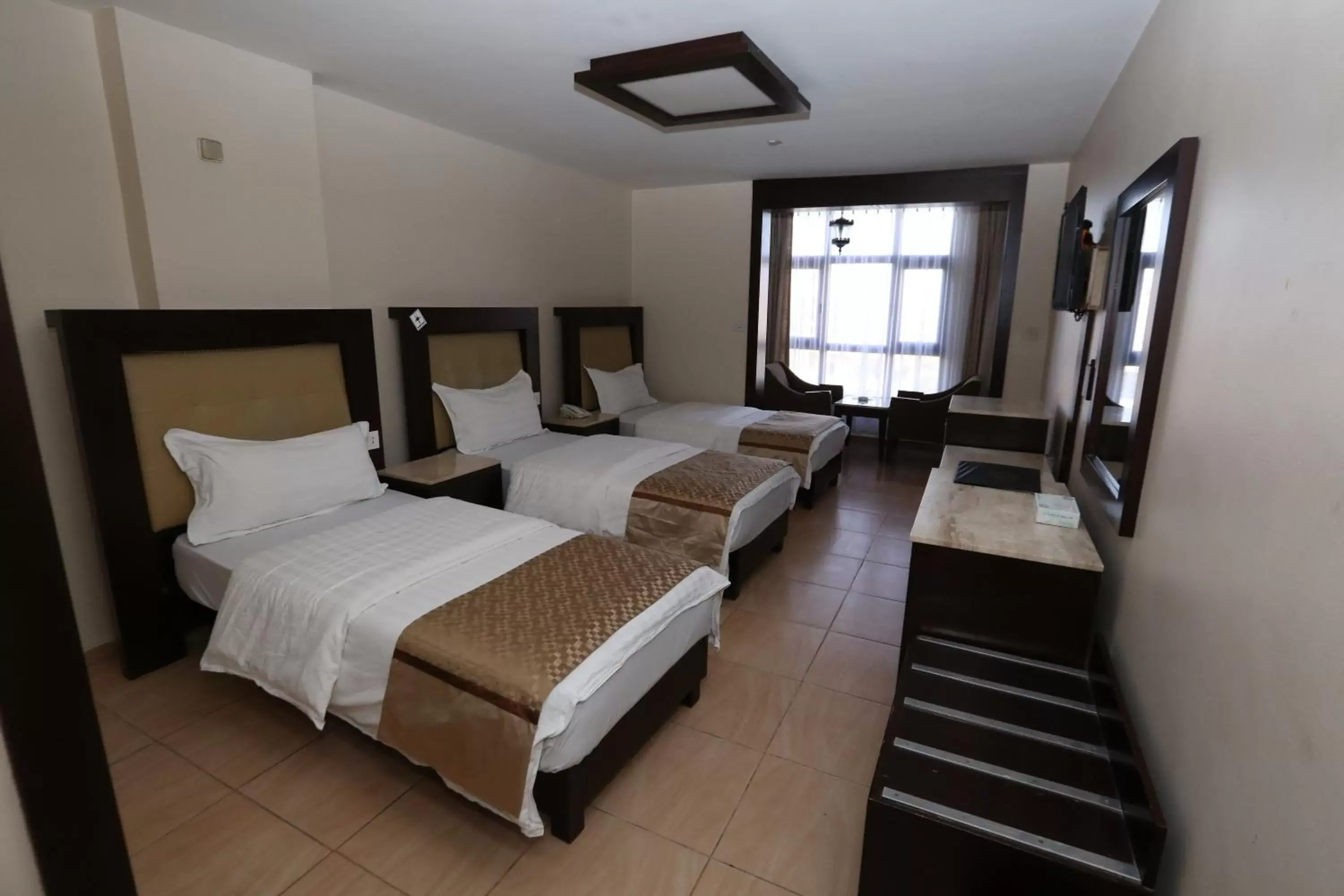 Deluxe Triple Room in Al Zaitouna Hotel Deluxe Triple Room in Al Zaitouna Hotel