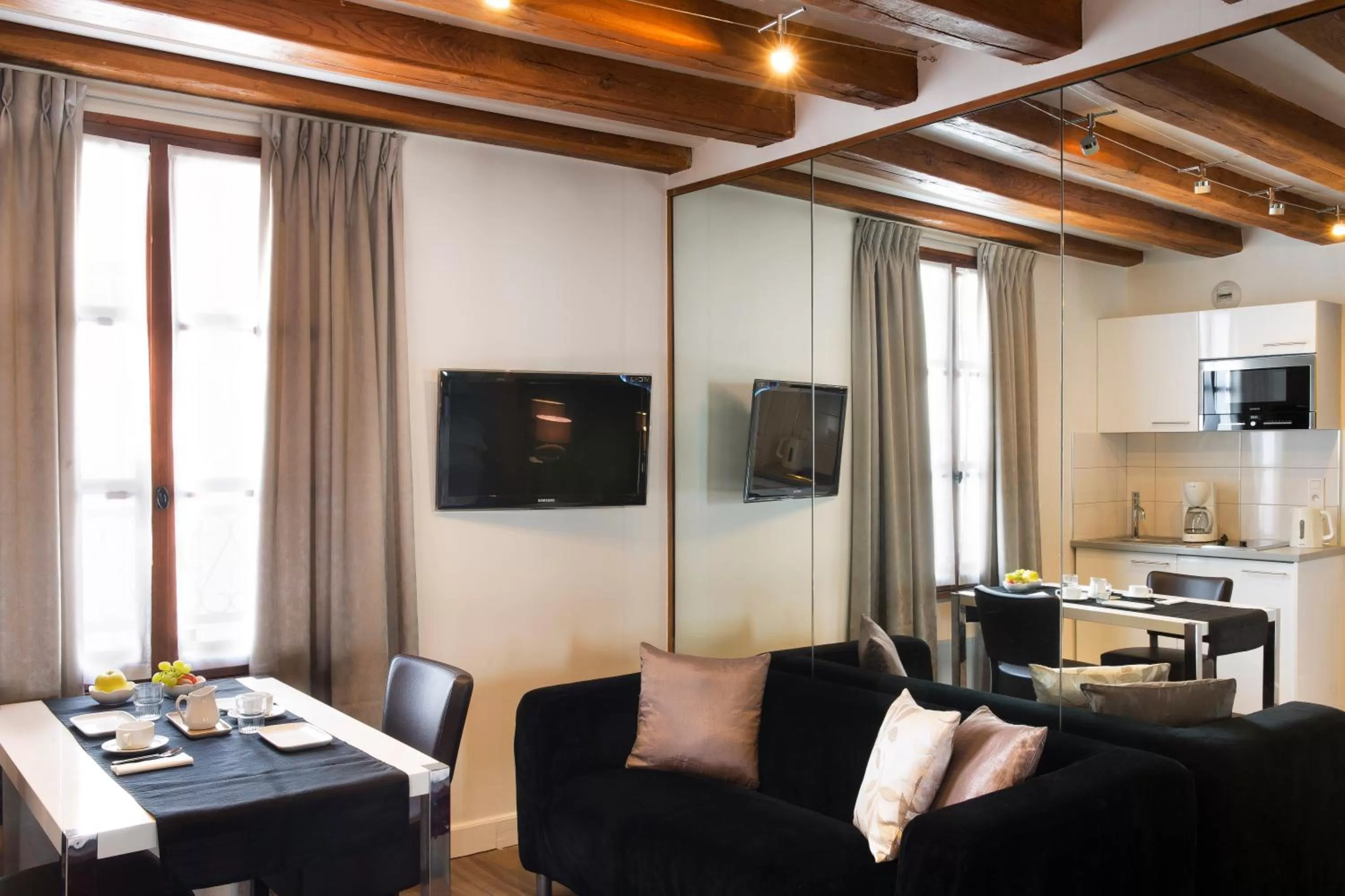 Bedroom in Lion d'Or Paris Hotel