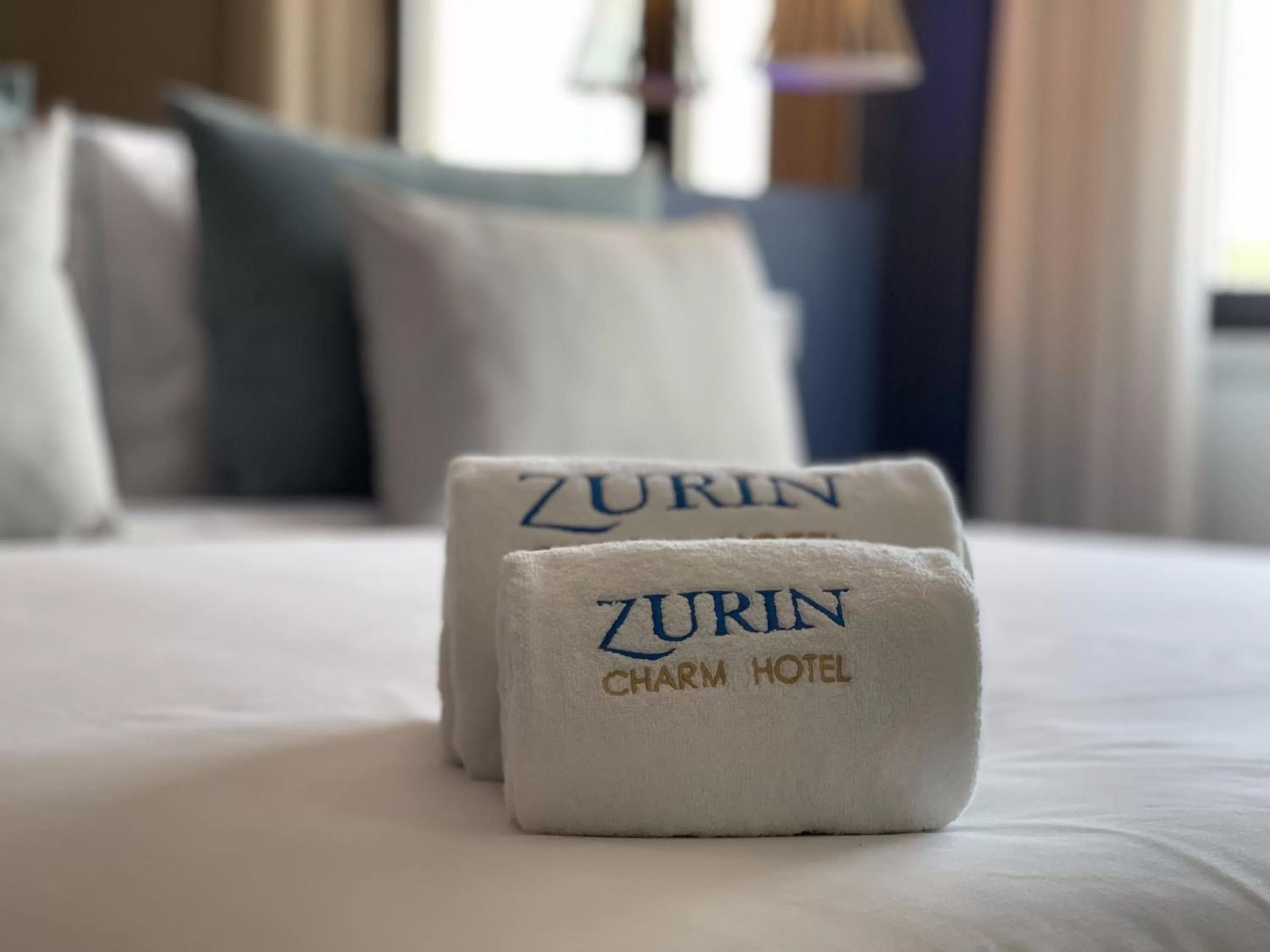 Bed in Zurin Charm Hotel