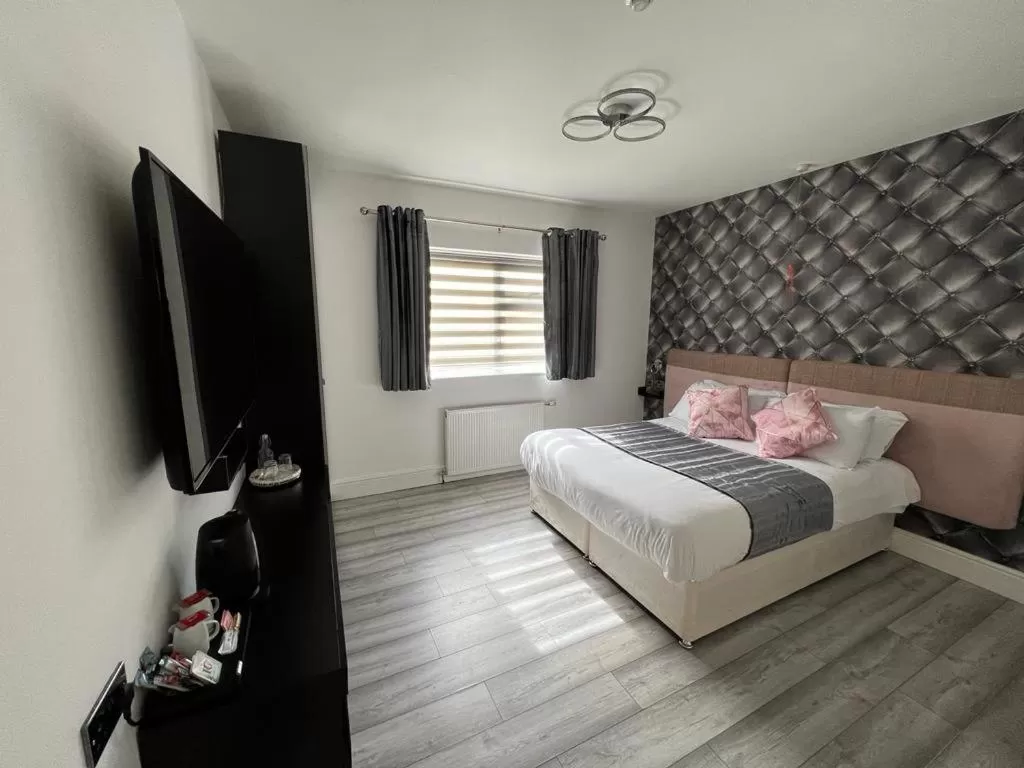 Bed in Charnwood Regency Guest House