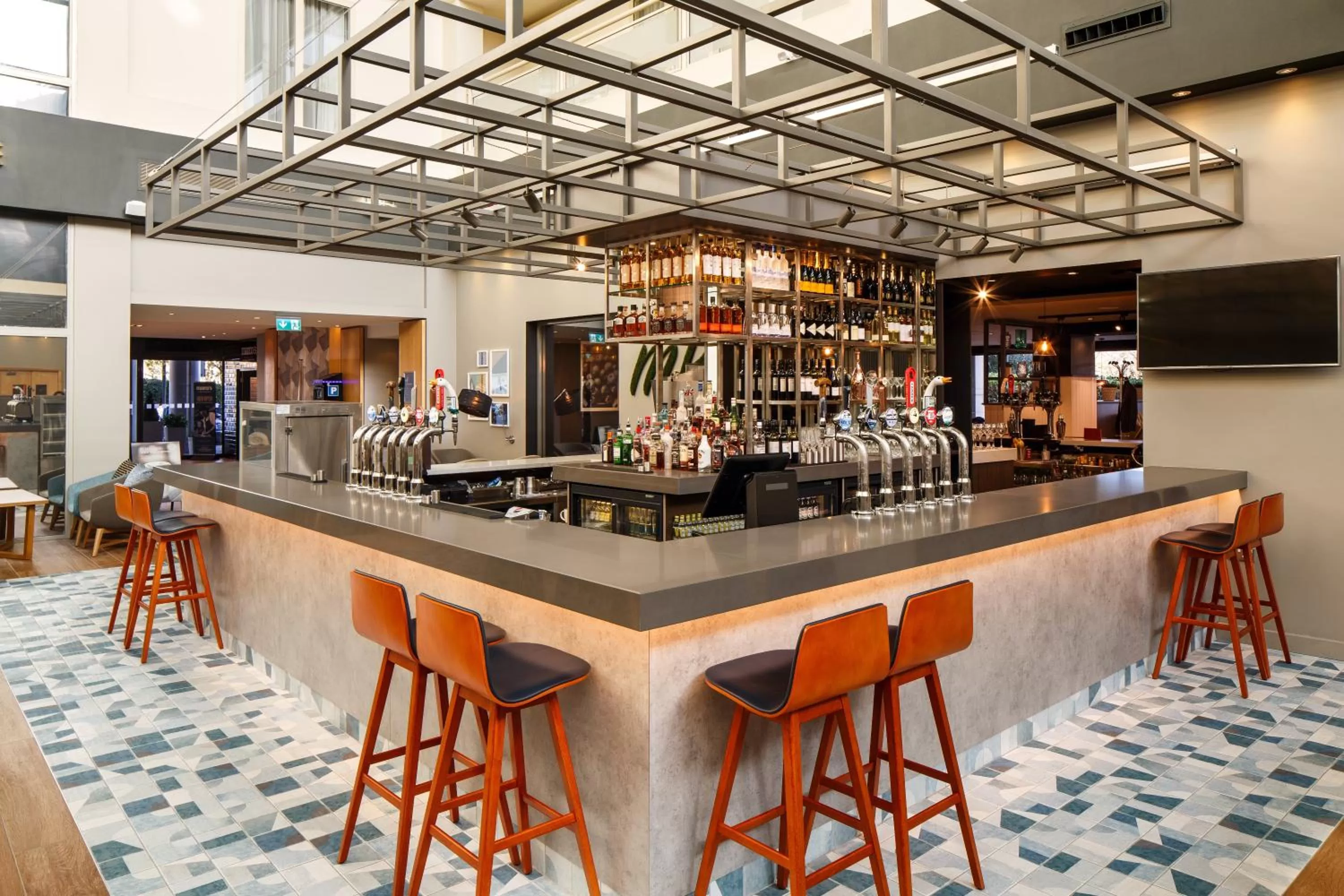 Lounge or bar in Holiday Inn Milton Keynes Central by IHG