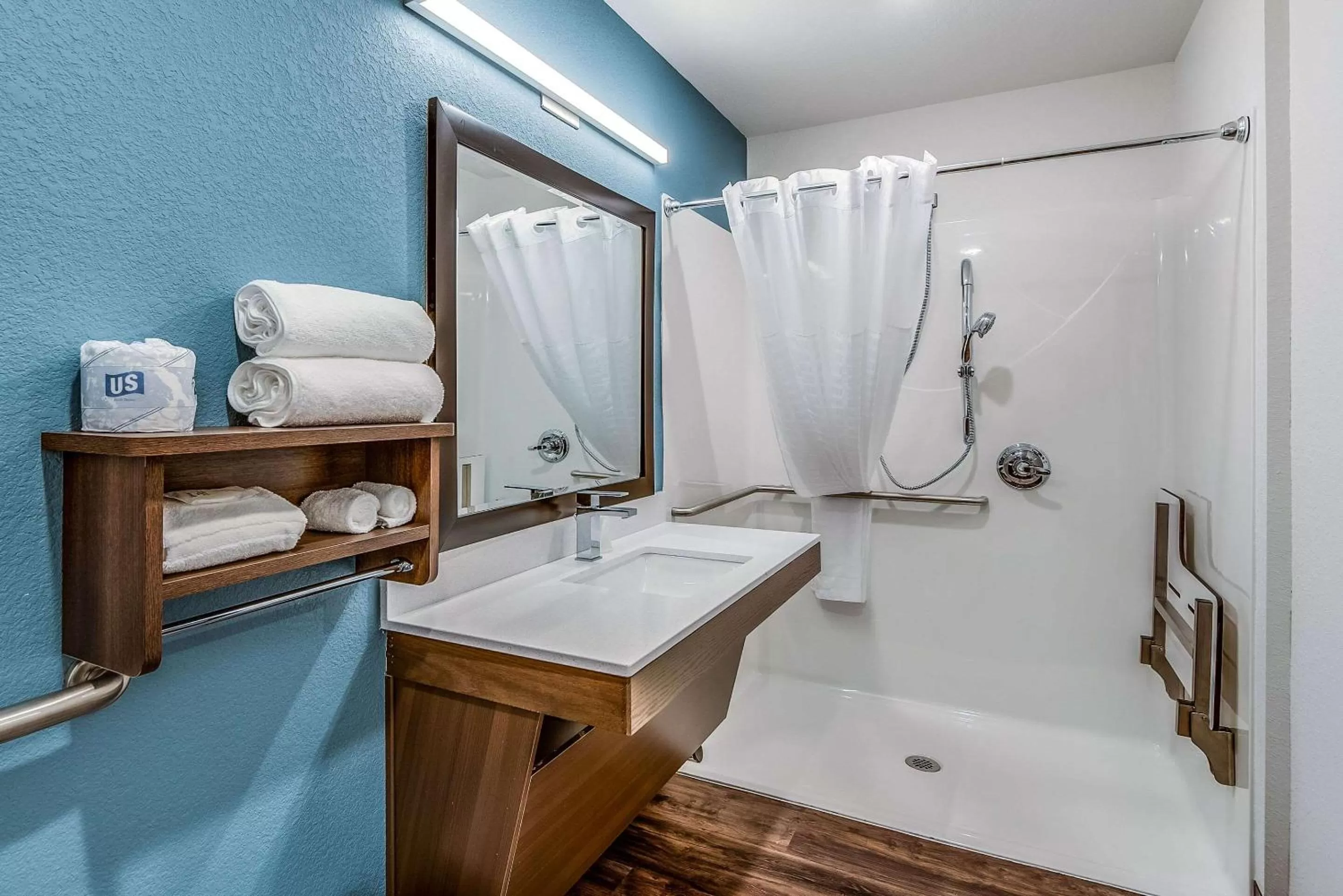 Bathroom in WoodSpring Suites West Des Moines