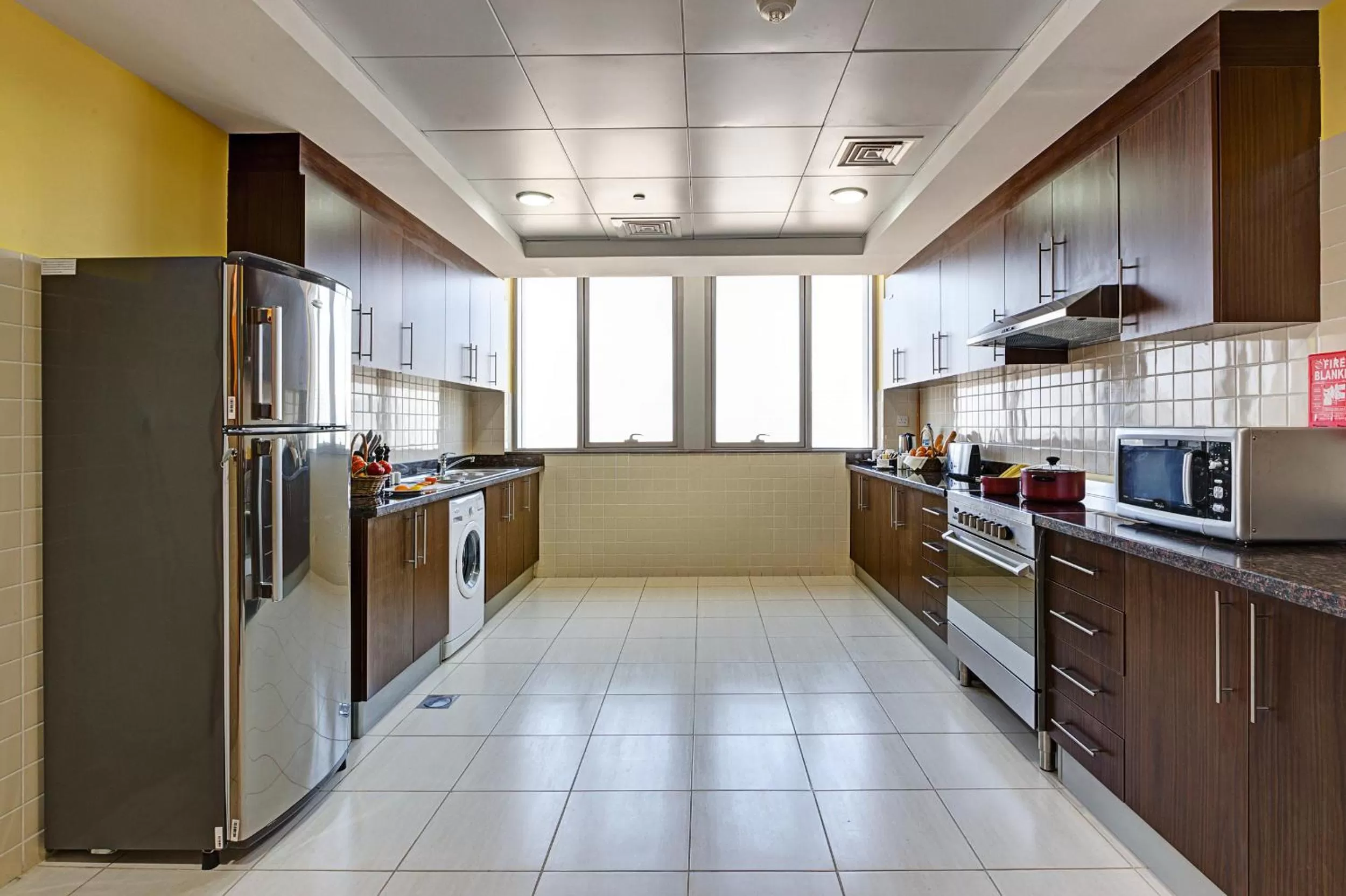 Kitchen or kitchenette in Abidos Hotel Apartment Dubai Land