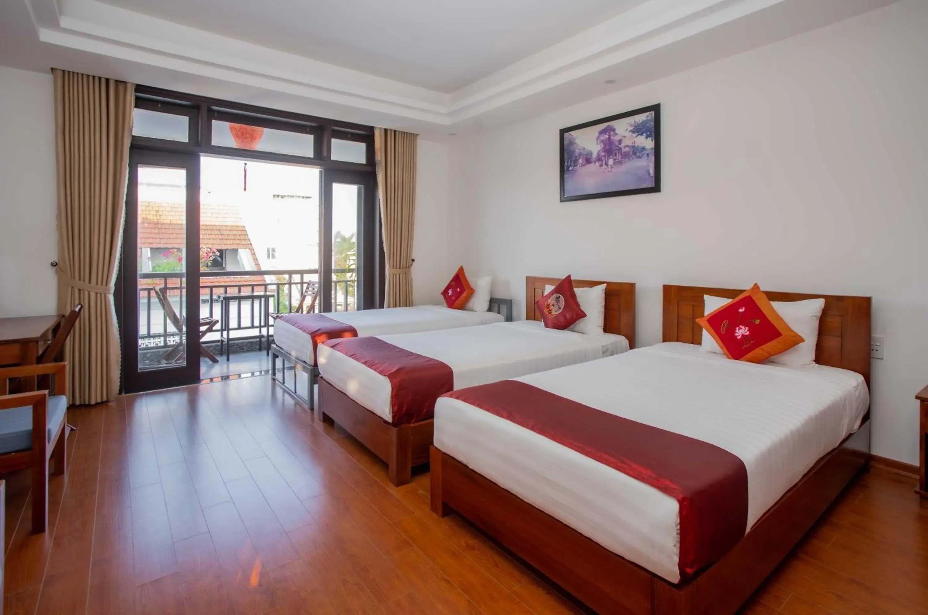Triple Room with Balcony in Trendy Life Villa Hoi An Triple Room with Balcony in Trendy Life Villa Hoi An