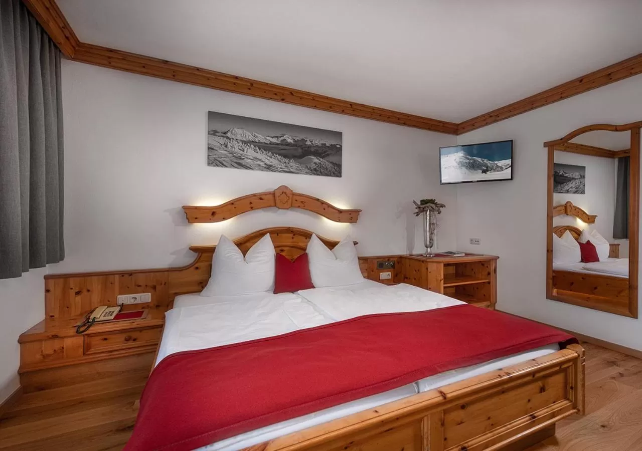 Bed in Hotel Hubertushof