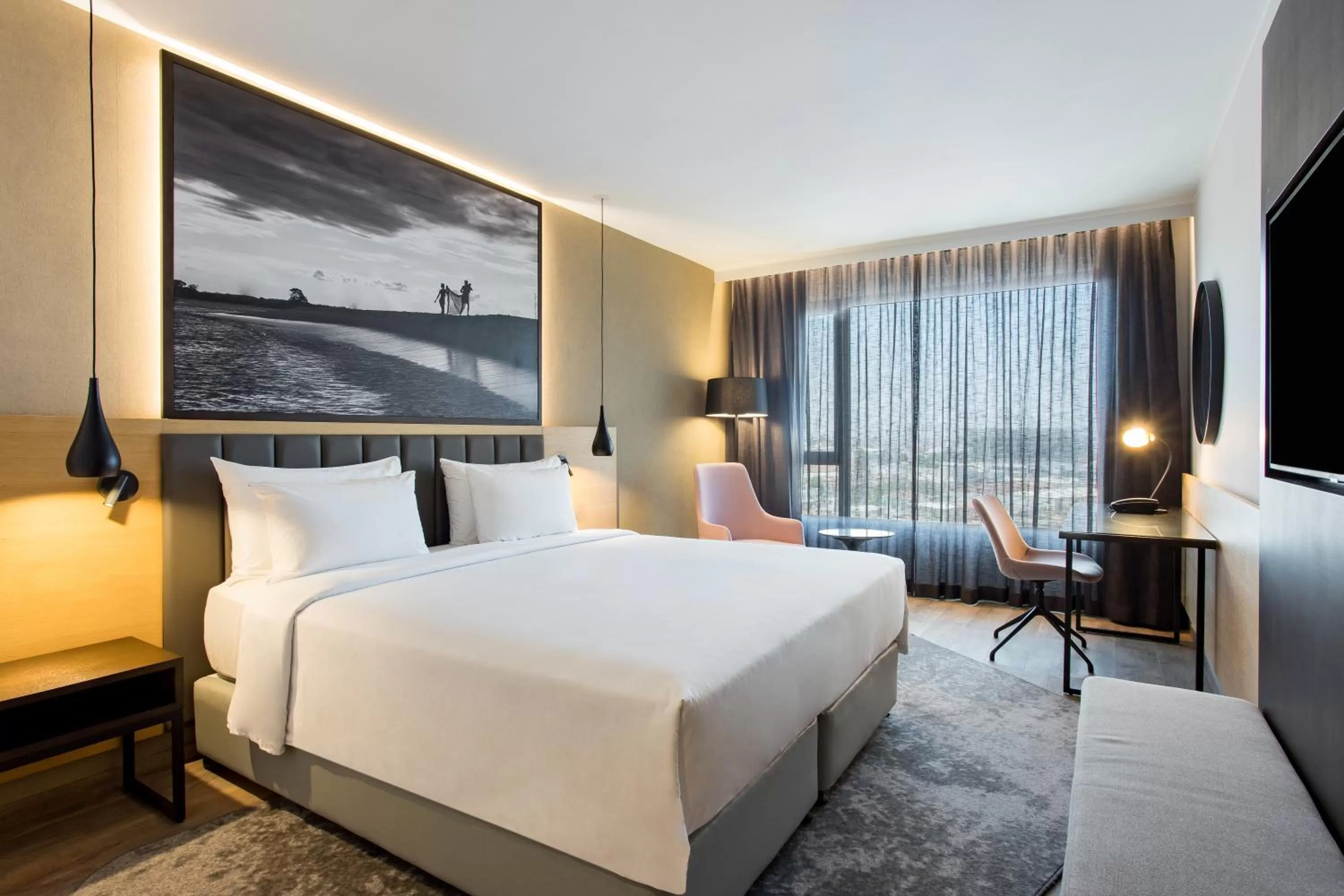 Photo of the whole room, Bed in Radisson Blu Hotel Antananarivo Waterfront