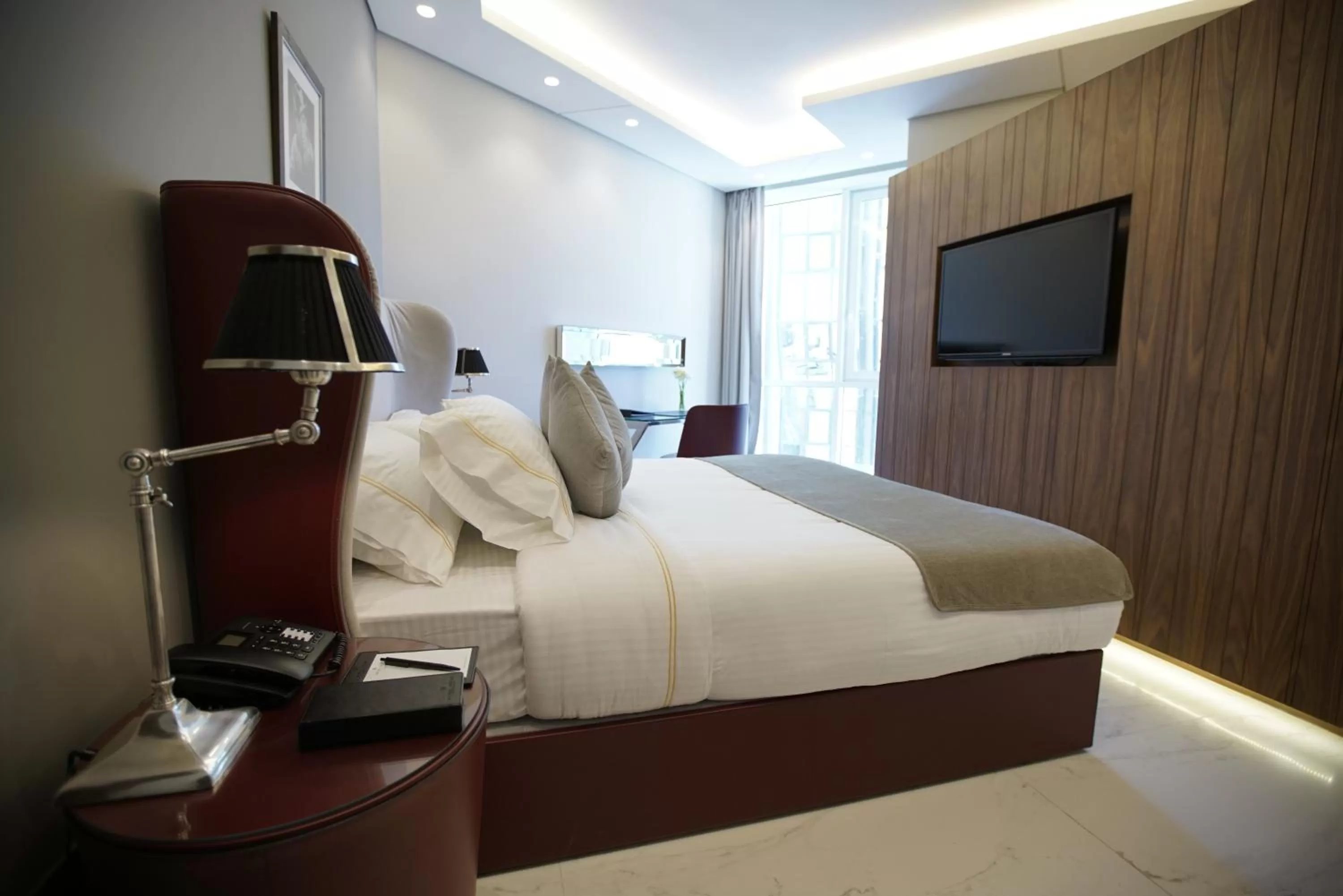 Living room, Bed in Royal Tulip Achrafieh