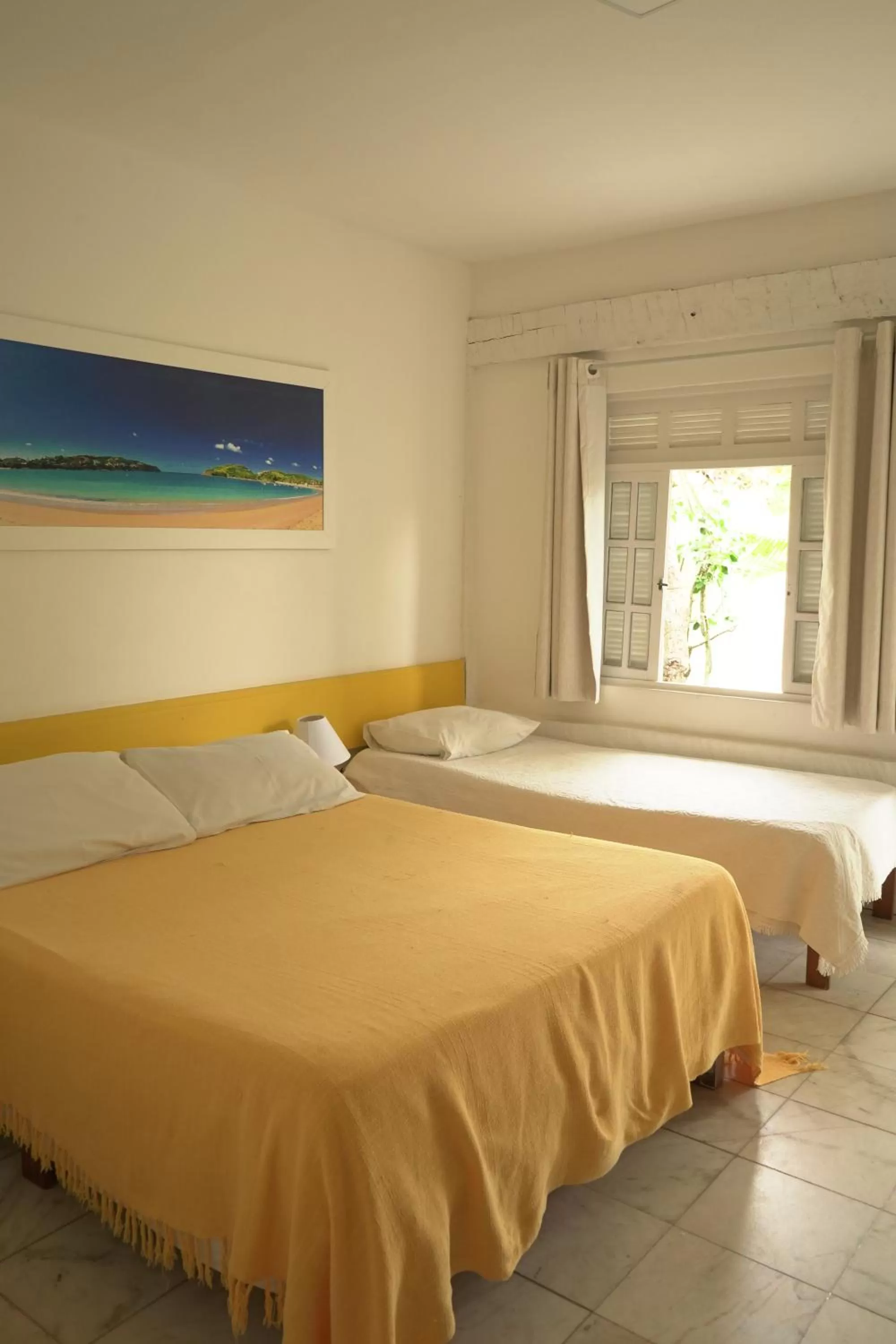 Bed in Pousada Manaaki