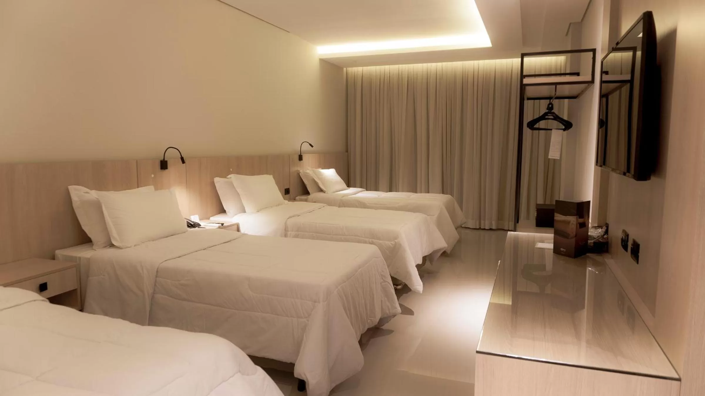 Bed in Rafain Palace Hotel & Convention Center