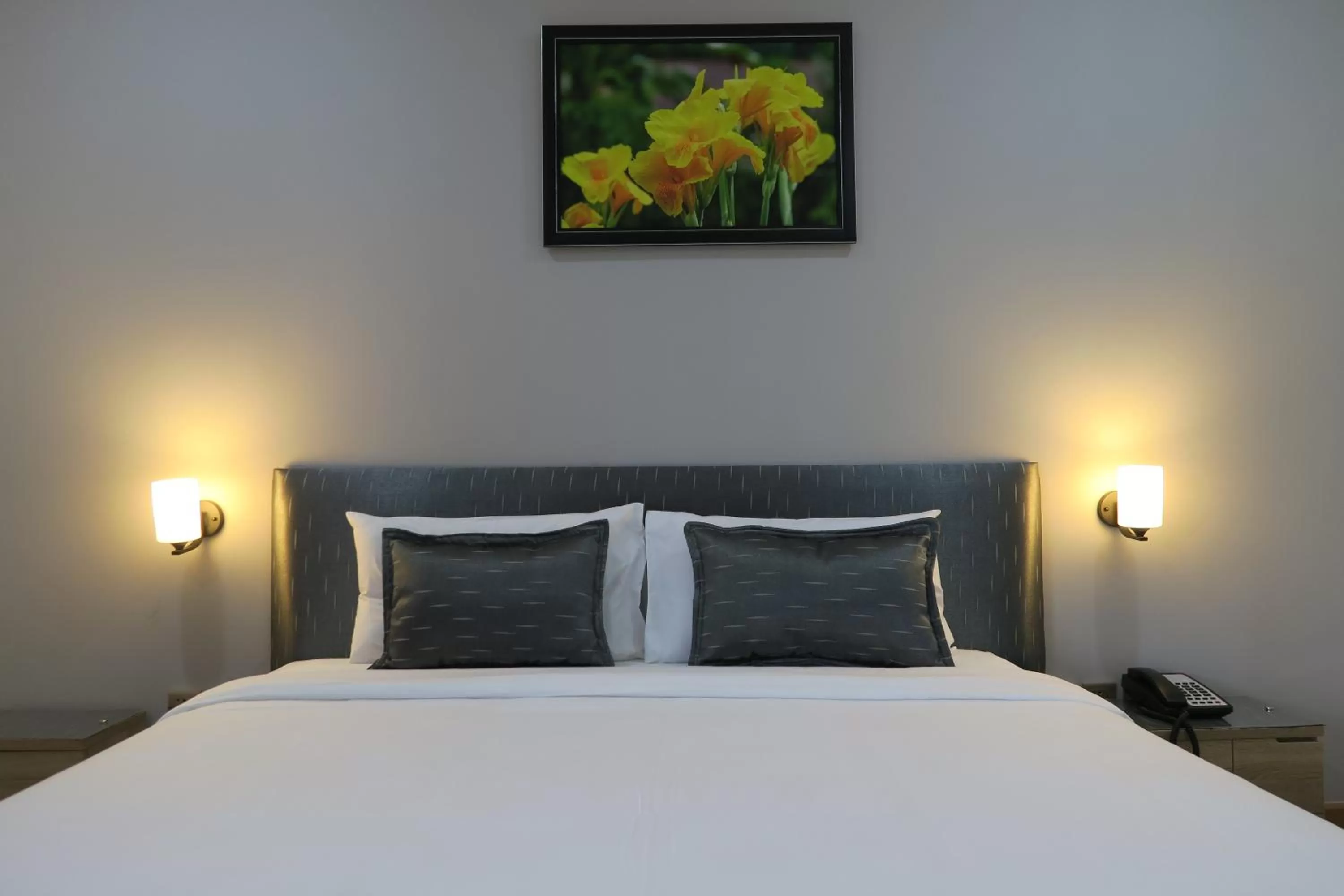 Bed in The Mira Hotel Chiang Rai