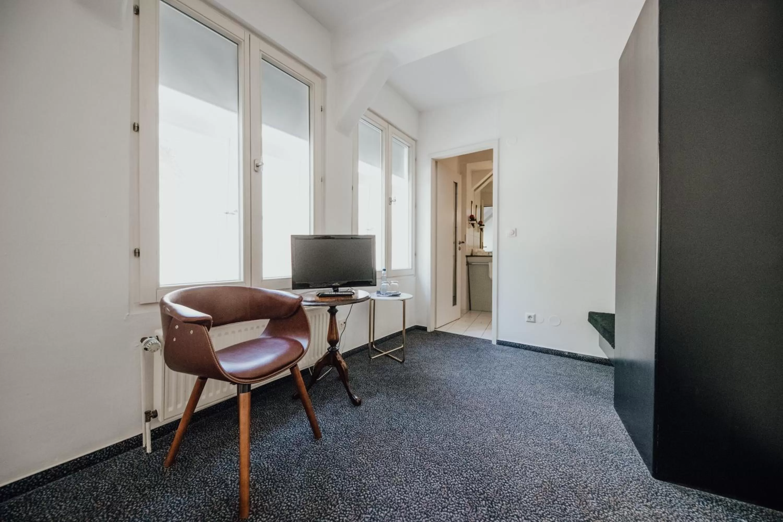 TV and multimedia in Magni Boutique Hotel